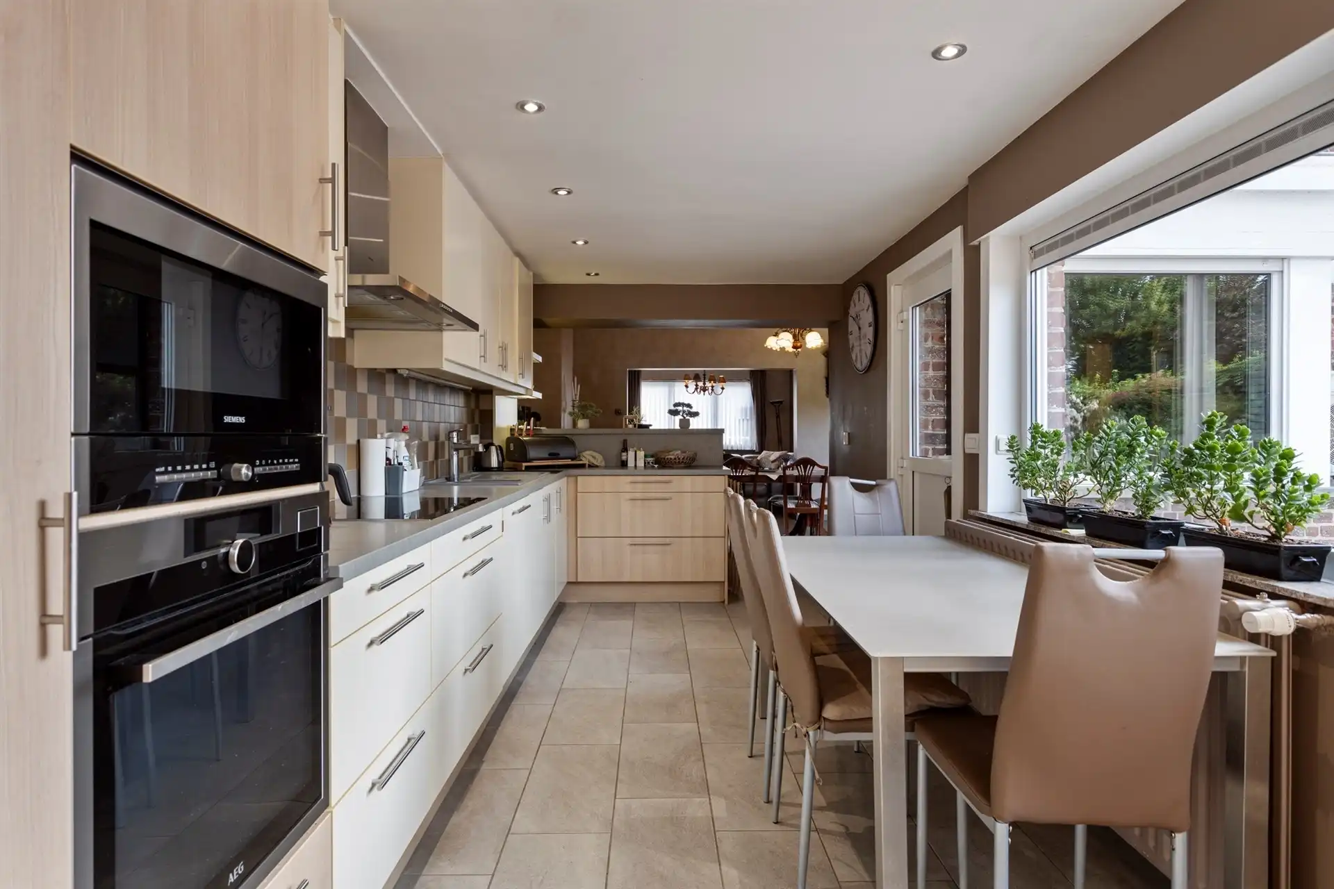 Woning met handelsruimte op commerciële topligging te Mazenzele foto 7