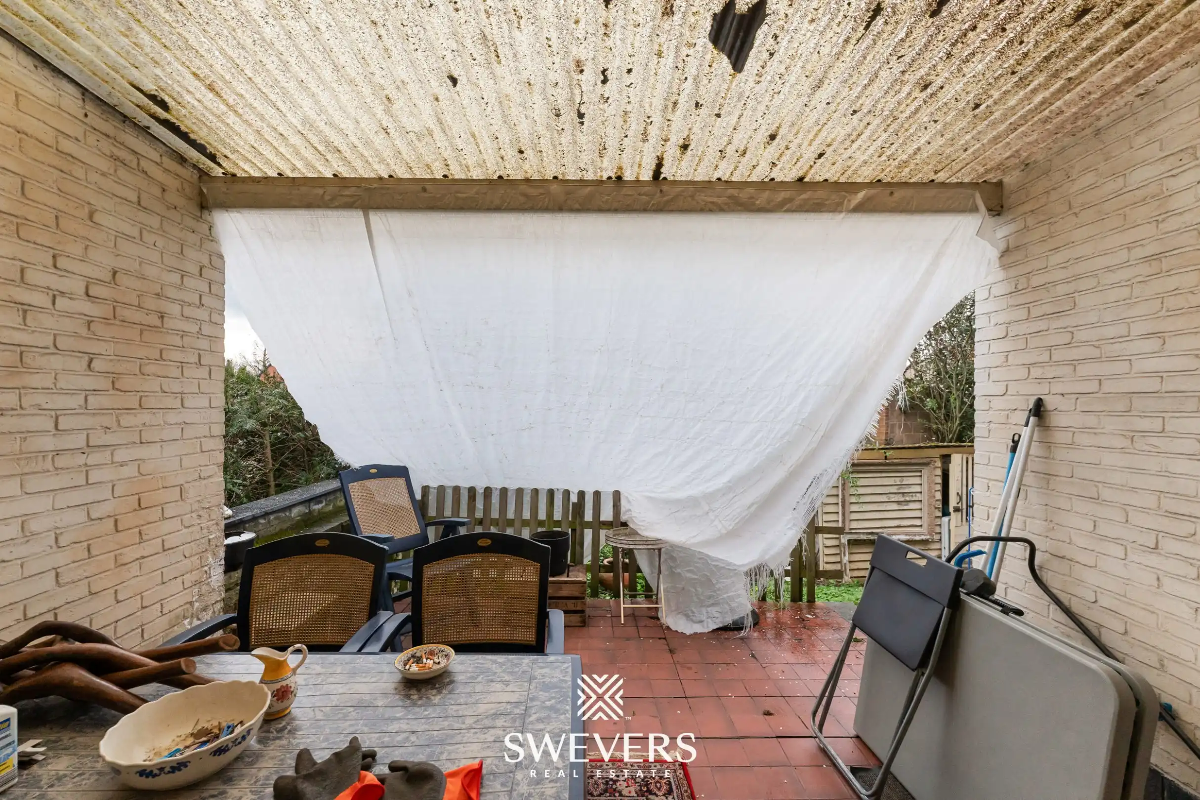 Ruime halfopen bebouwing met 4 slaapkamers en veel renovatiepotentieel op topligging in Hasselt foto 22