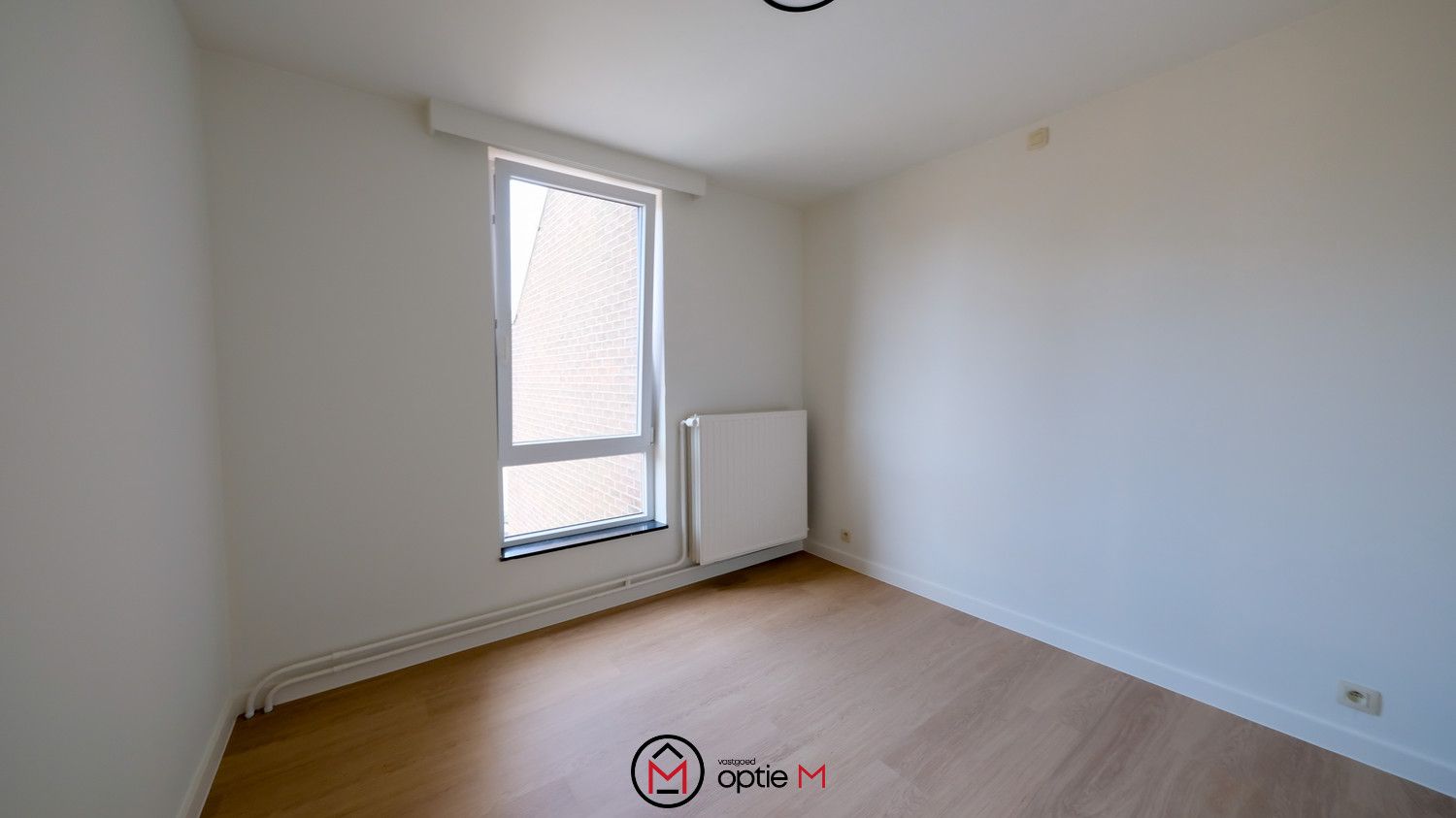 RUIM APPARTEMENT MET 3 SLAAPKAMERS, TERRAS EN GARAGEBOX foto 8