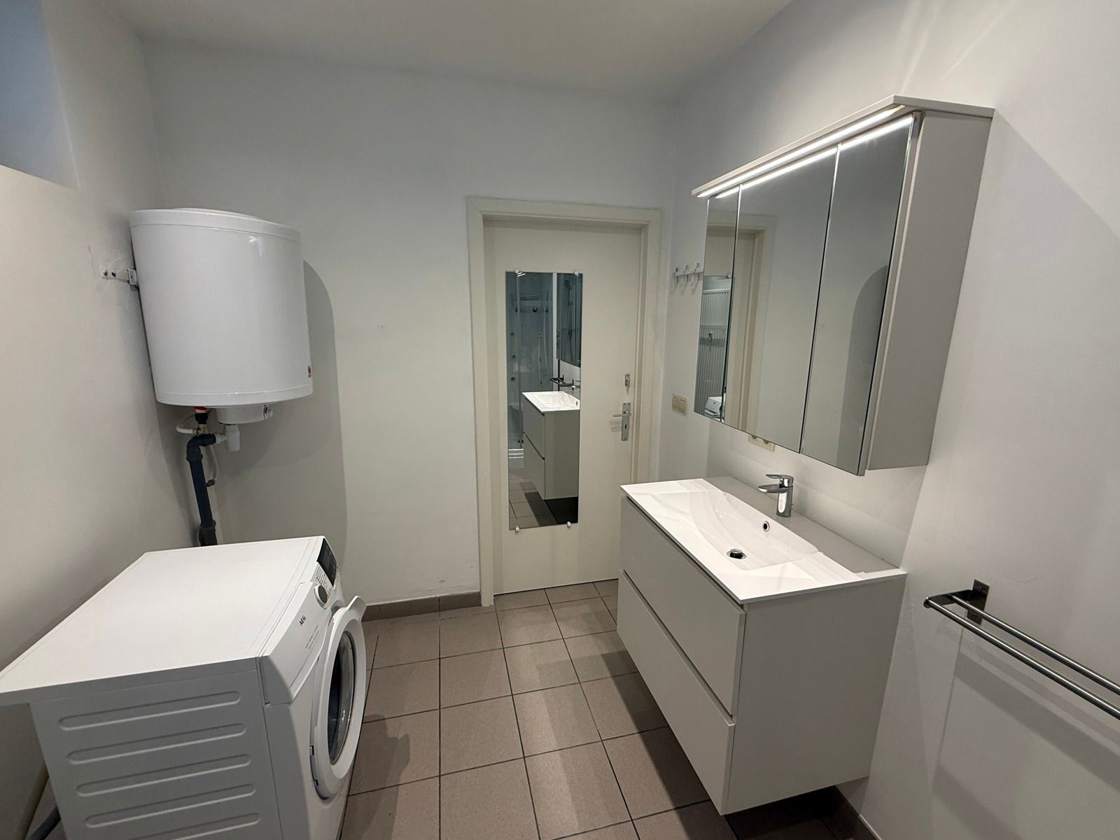 Opbrengsteigendom 2 appartementen en 2 commerciële ruimtes foto 32