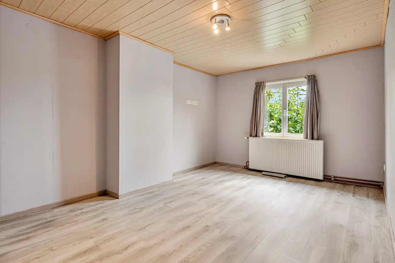 Ideale halfopen starterswoning (met twee autostaanplaatsen vóór de woning) op wandelafstand van het centrum van het vernieuwde Zeveneken! foto 12