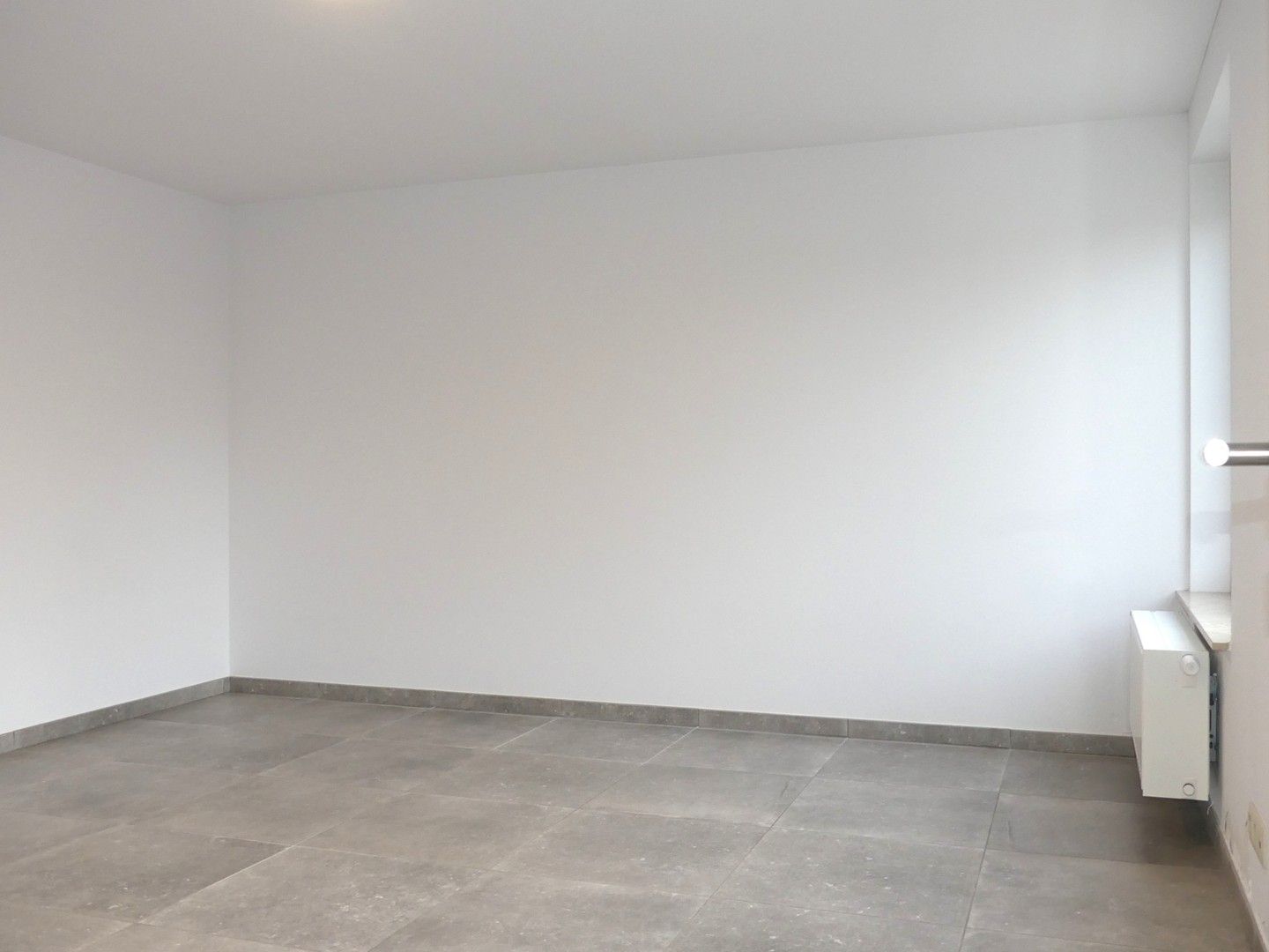 Halfopen nieuwbouwwoning met binnenterras, tuintje en garage - 3 slaapkamers foto 8