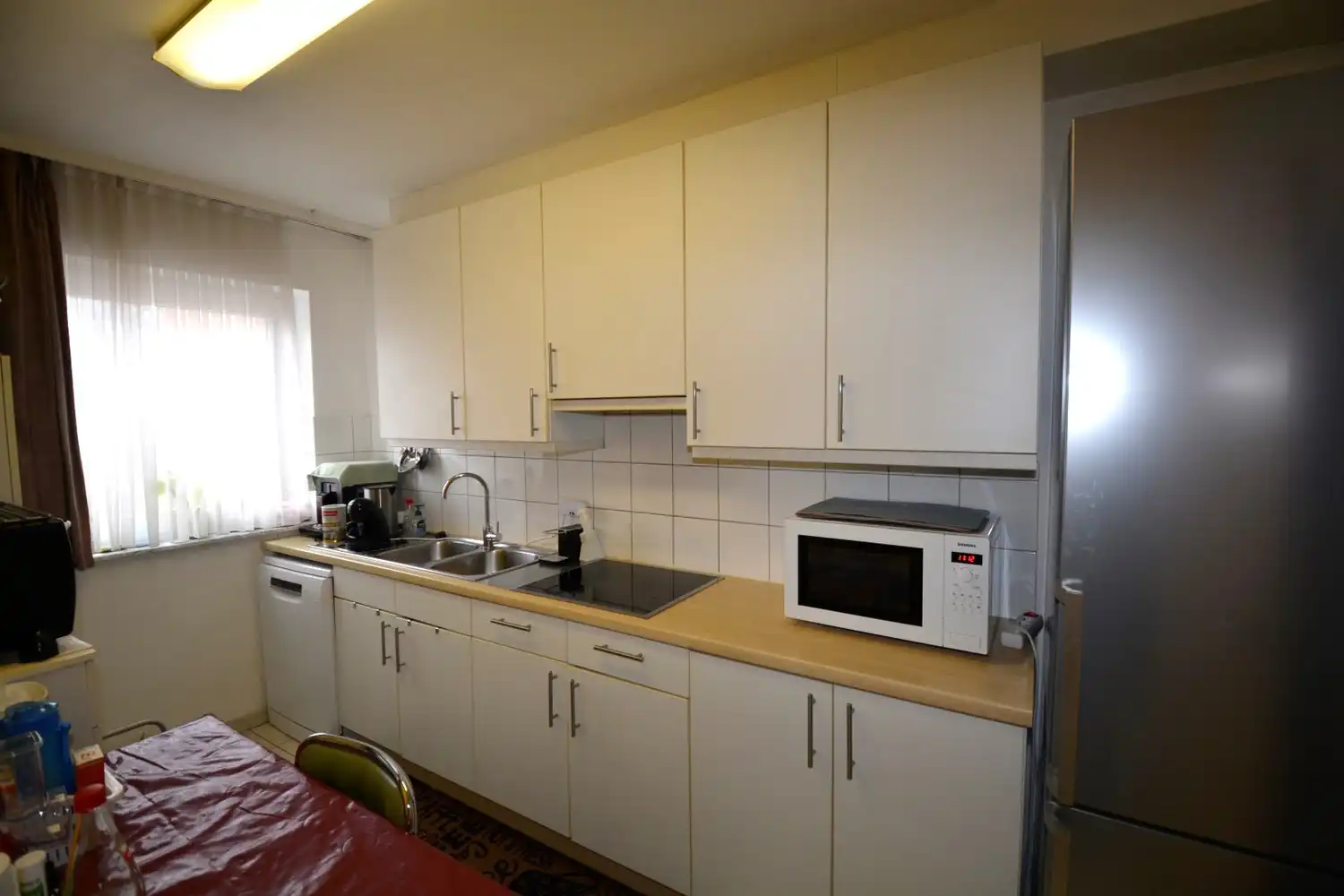 APPARTEMENT MET 2 SLK, TERRAS EN  GARAGEBOX! foto 3