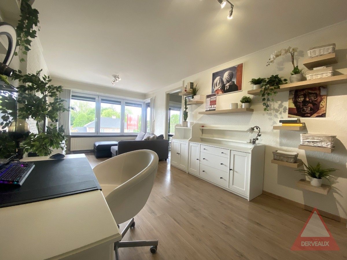 Menen - Verzorgd appartement met terras en garage op centrale ligging foto 3
