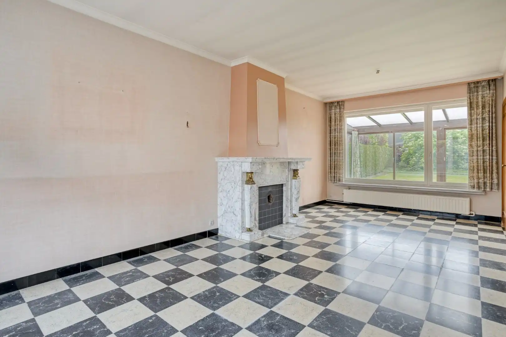 Te renoveren woning met garage en tuin in het centrum van Wevelgem! foto 2