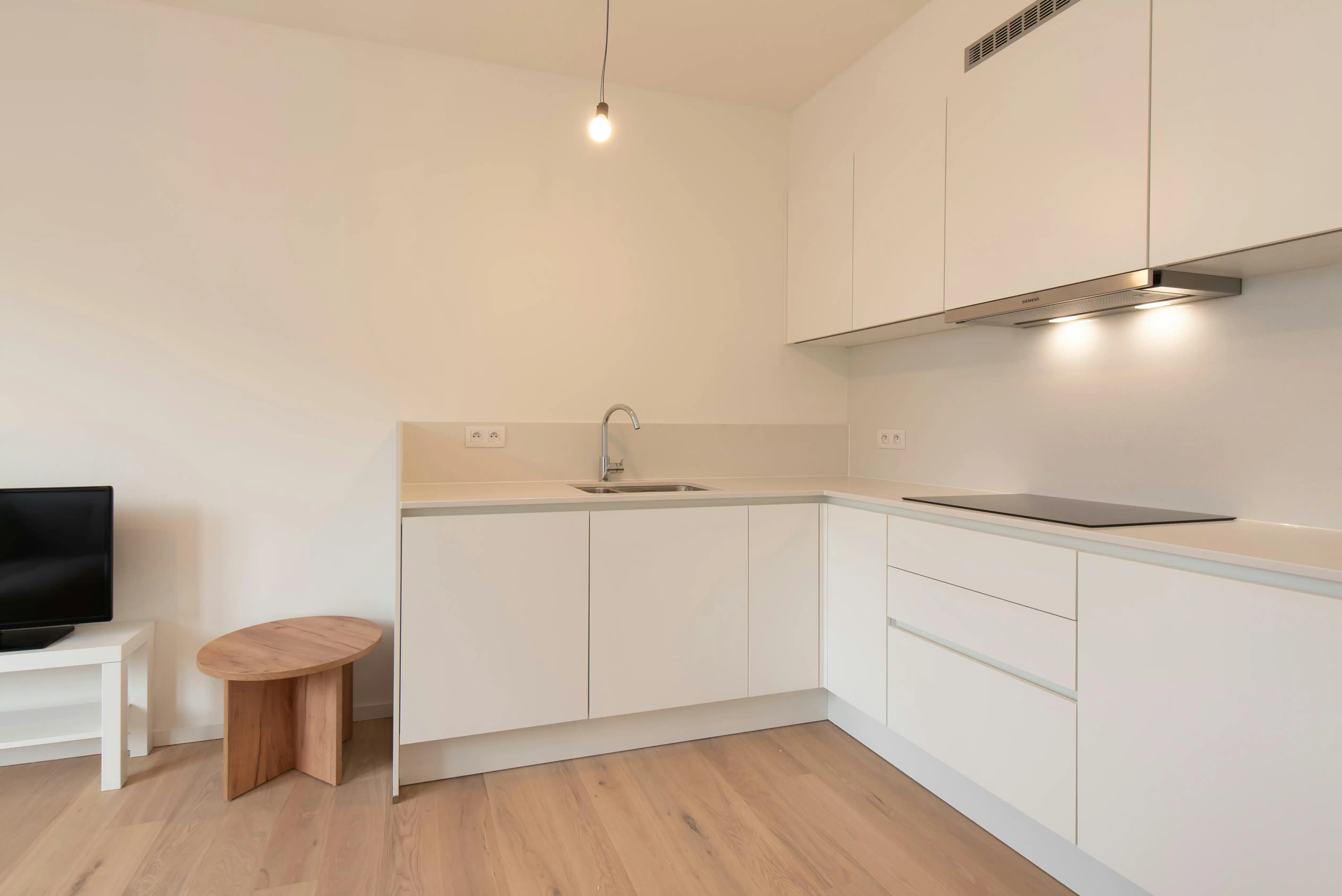 Lichtrijk nieuwbouw 1-slaapkamer appartement te Oostende foto 8