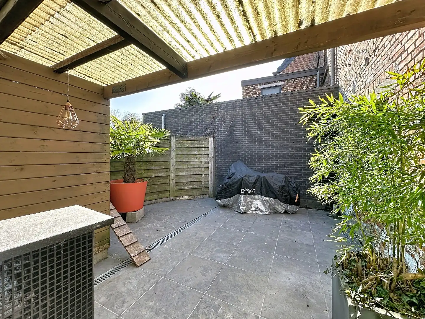 Instapklaar huisje met zonnig terras in Herent foto 16
