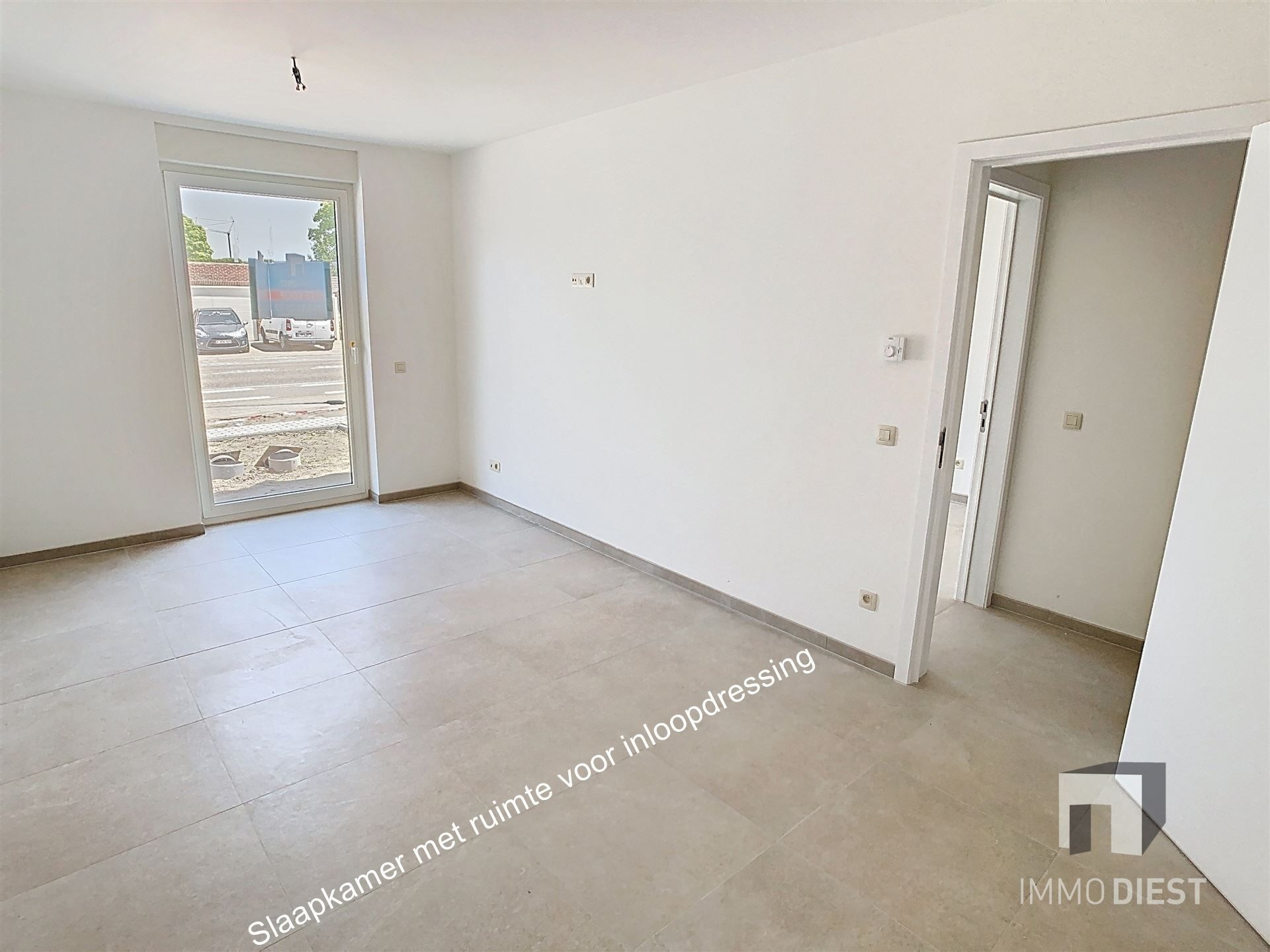 Gelijkvloers appartement met terras en tuintje foto 13