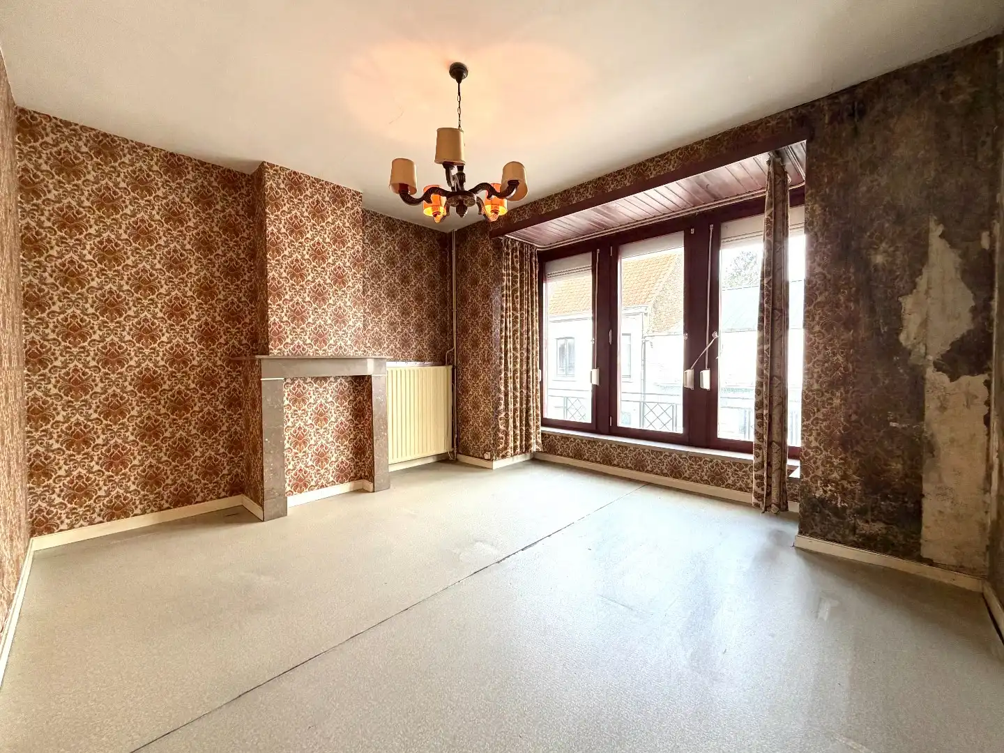 Te renoveren rijwoning met 4 slaapkamers en tuin in Kortrijk foto 11