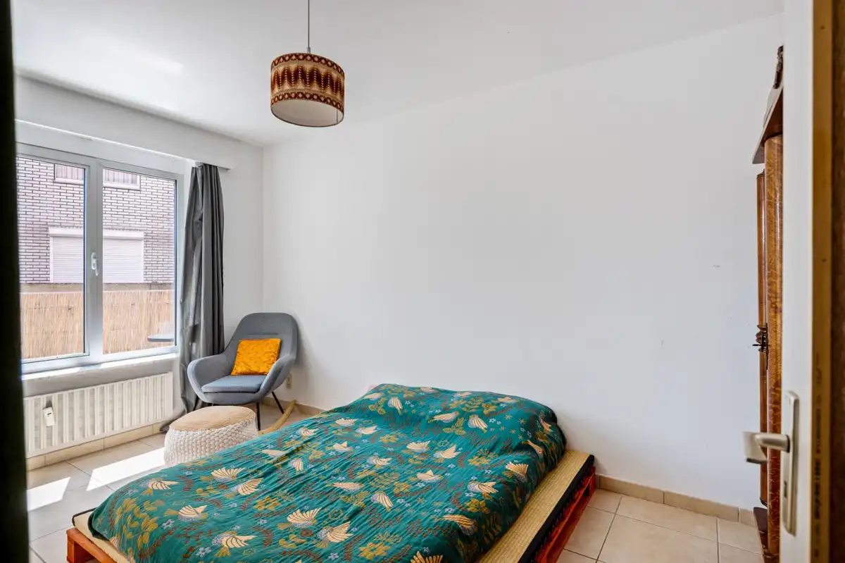 Licht, rust en stadse dynamiek ... in dit gelijkvloers hoekappartement met 2 slaapkamers komt het mooi samen. foto 4