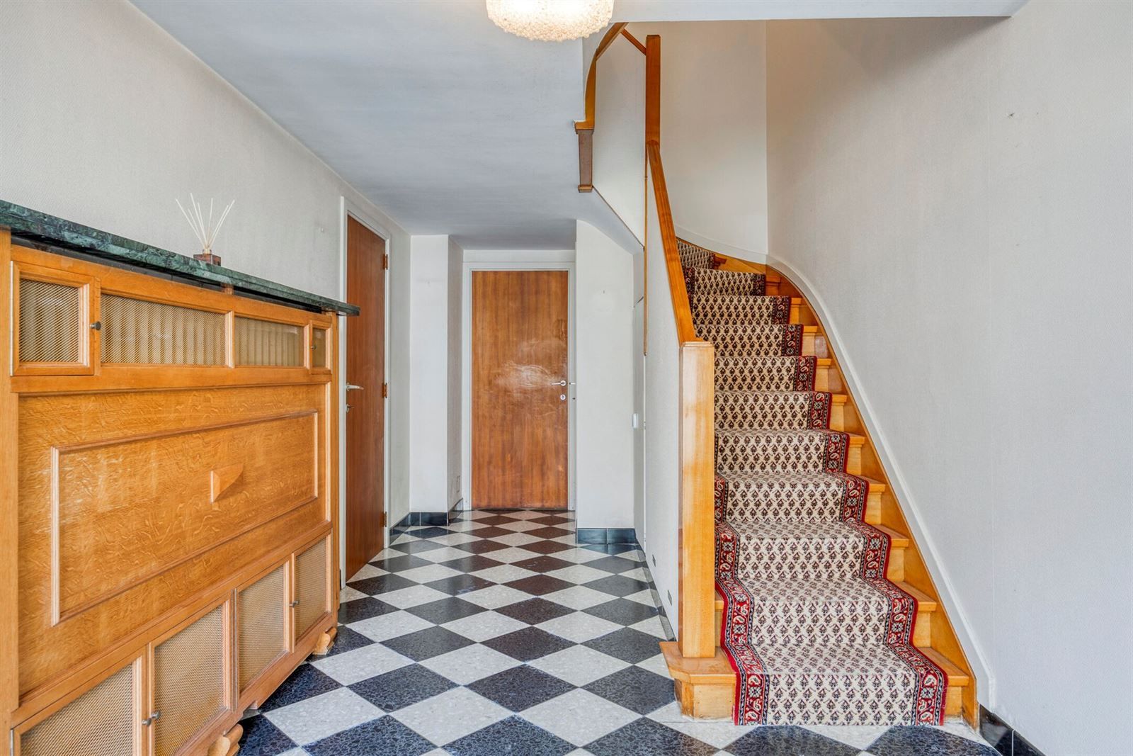 Ruime en zeer goed onderhouden 3-gevelwoning (EPC C) met garage foto 4