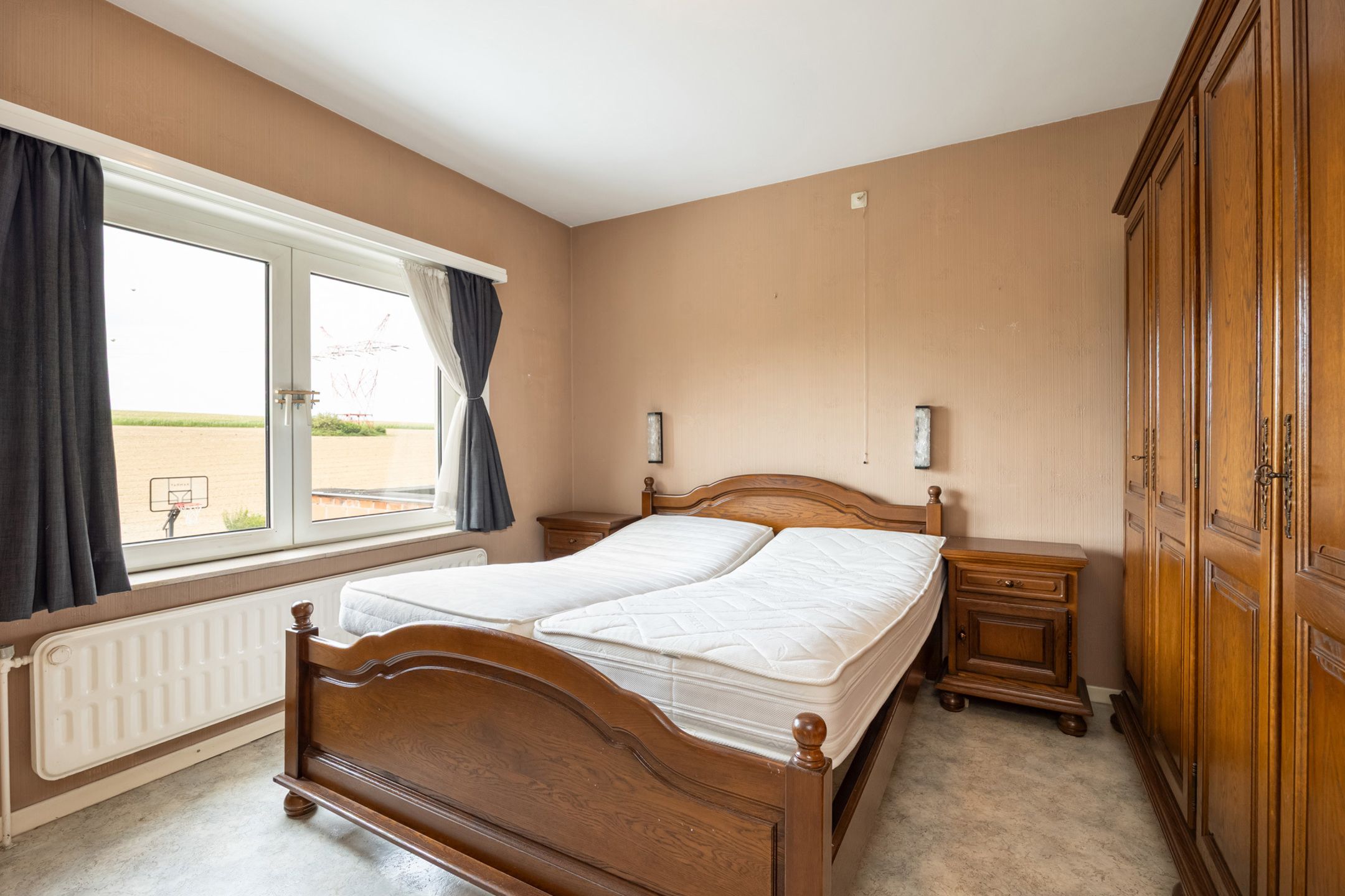 Te renoveren woning met zicht op velden in Grimbergen foto 8