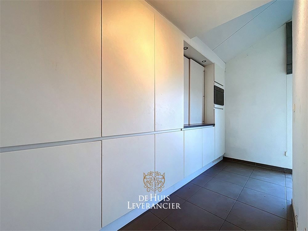 Luxueuze serviceflat met 1 slk en ruim terras foto 13