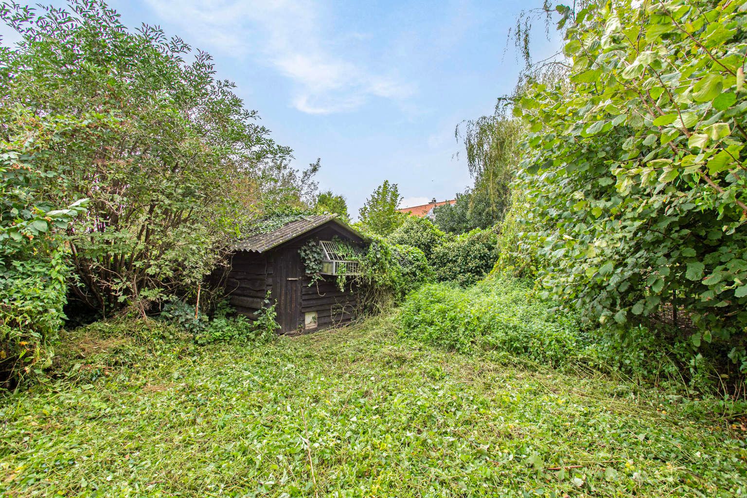 DEGELIJKE,  TE RENOVEREN WONING MET TUIN IN VERTRIJK foto 25