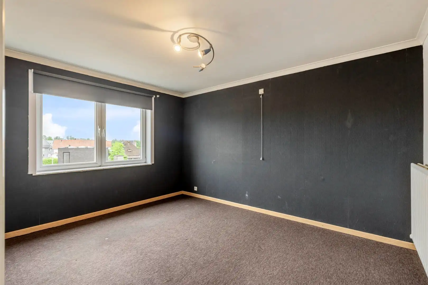 Comfortabel, zeer ruim appartement met 4 slaapkamers, terras en garage in het centrum van Neeroeteren!  foto 32