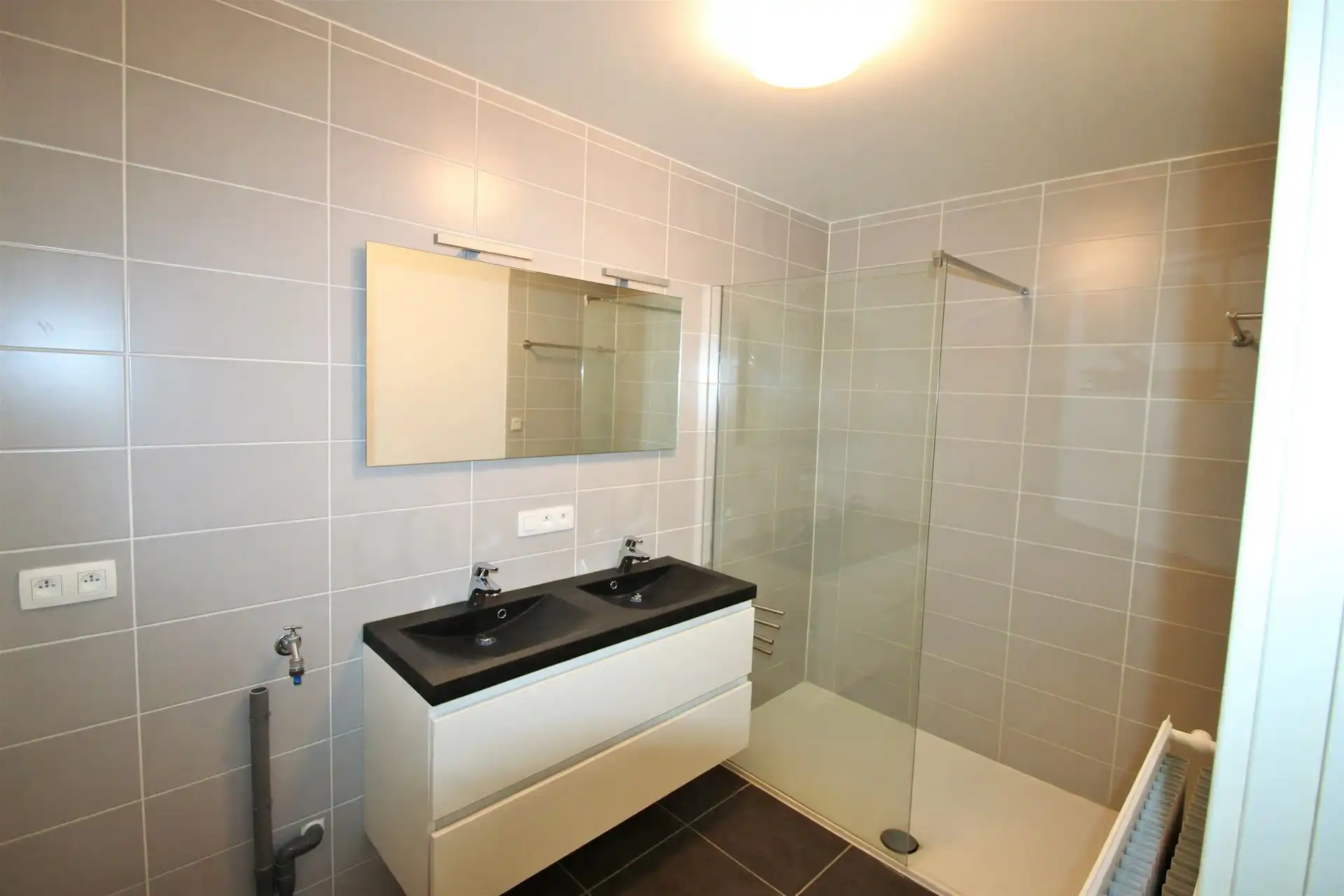 Gelijkvloersappartement met tuin en 2 slaapkamers foto 6