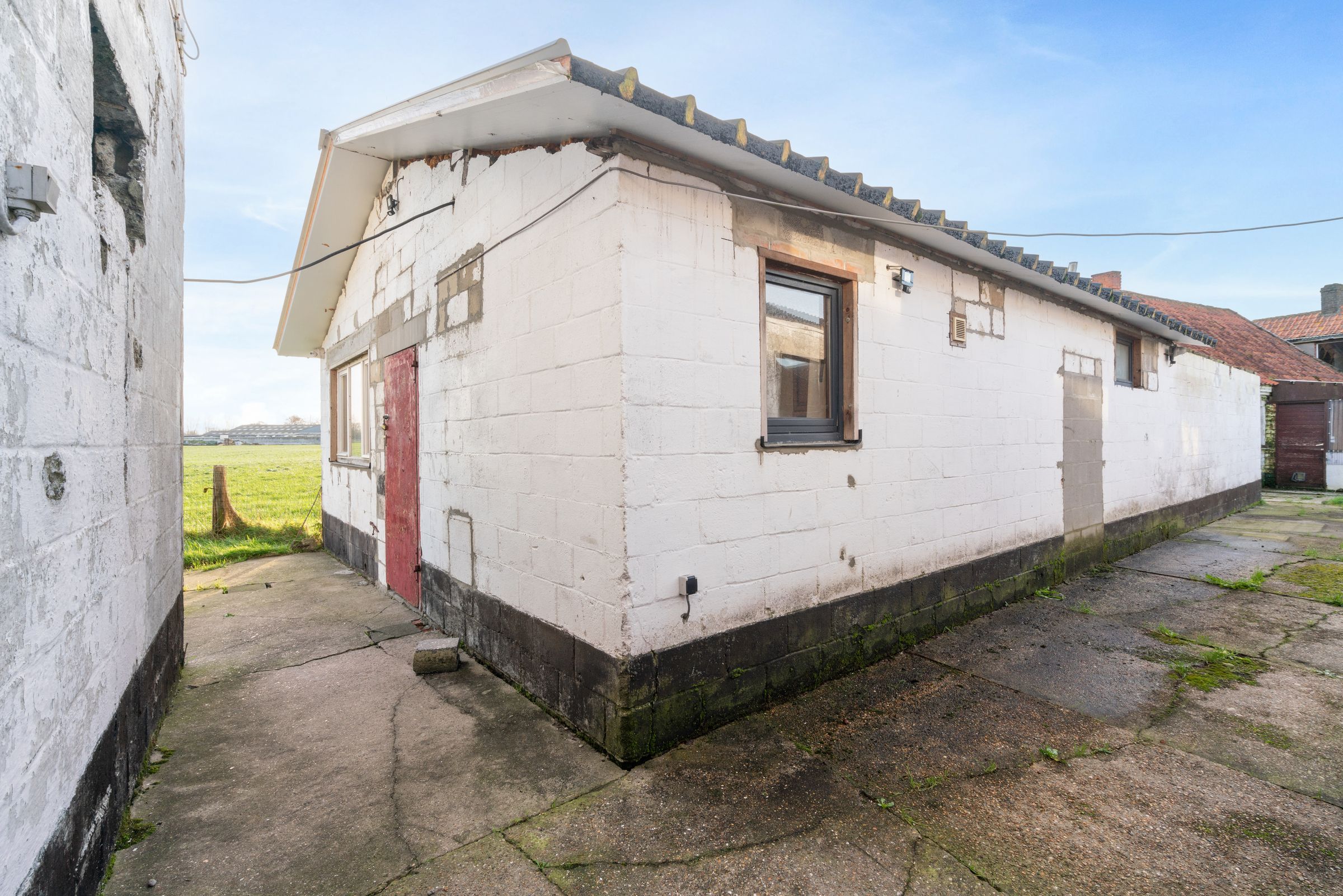 Te renoveren woning met zicht op de velden te Knesselare foto 16