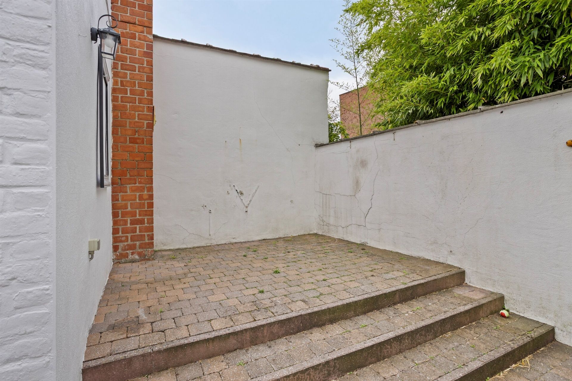 Instapklare rijwoning met stadskoer in hartje Merchtem foto 24