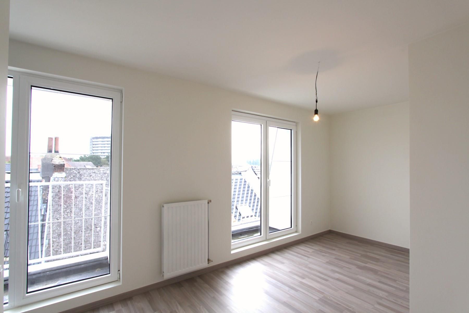 Knap, centraal gelegen nieuwbouwappartement foto 3