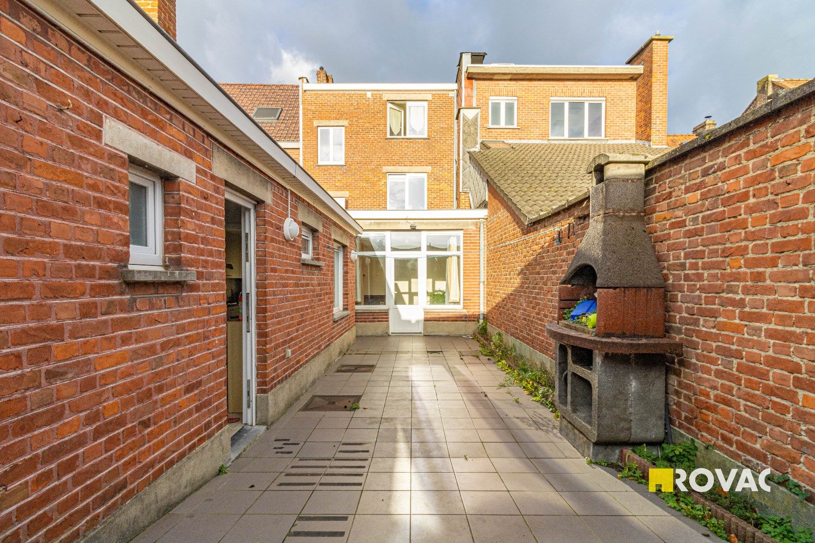 Opbrengsteigendom met 2 instapklare appartementen en 2 garages - uitweg achteraan foto 11