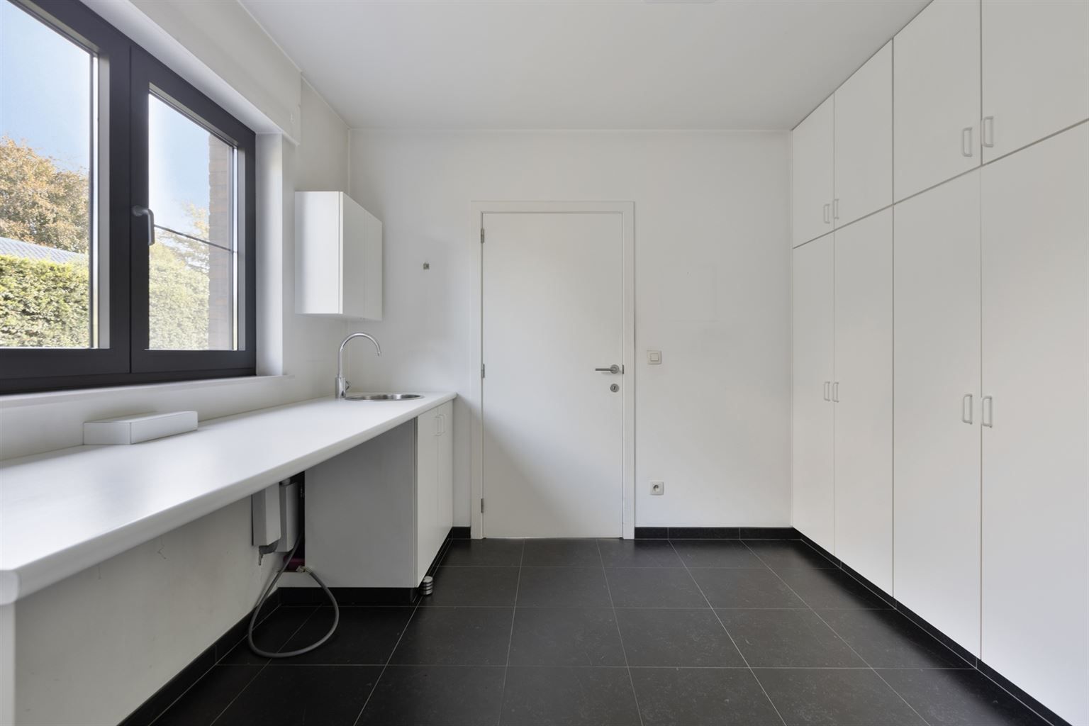 Instapklare, vrijstaande woning op 5a14ca. Voorzien van 4 slaapkamers en een inpandige garage op een rustige locatie in Kinrooi.  foto 22