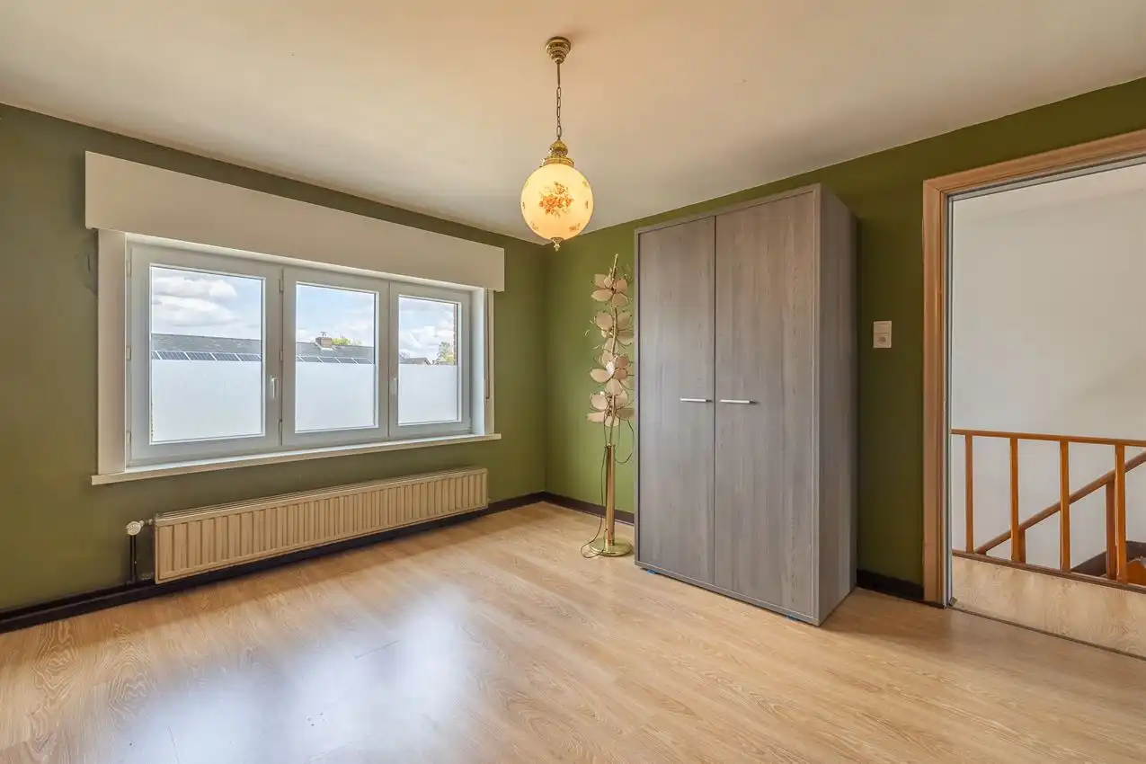 Degelijke gezinswoning met 3slpk, garage, zuid-west gerichte tuin foto 15