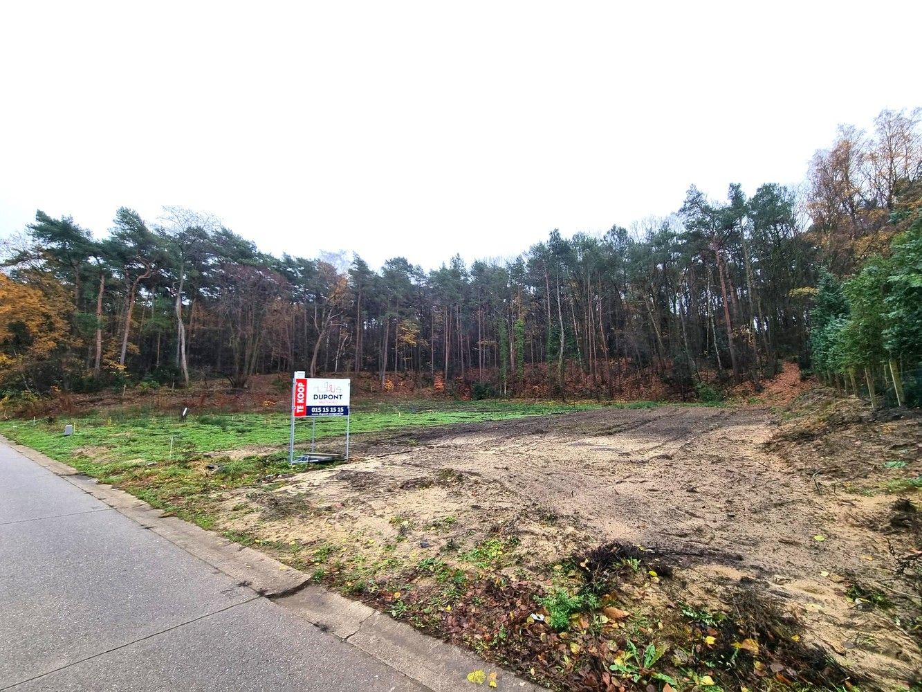 Bouwgrond vrijstaande woning, zuidgericht en zeer rustige ligging met groen boszicht achteraan foto {{pictureIndex}}