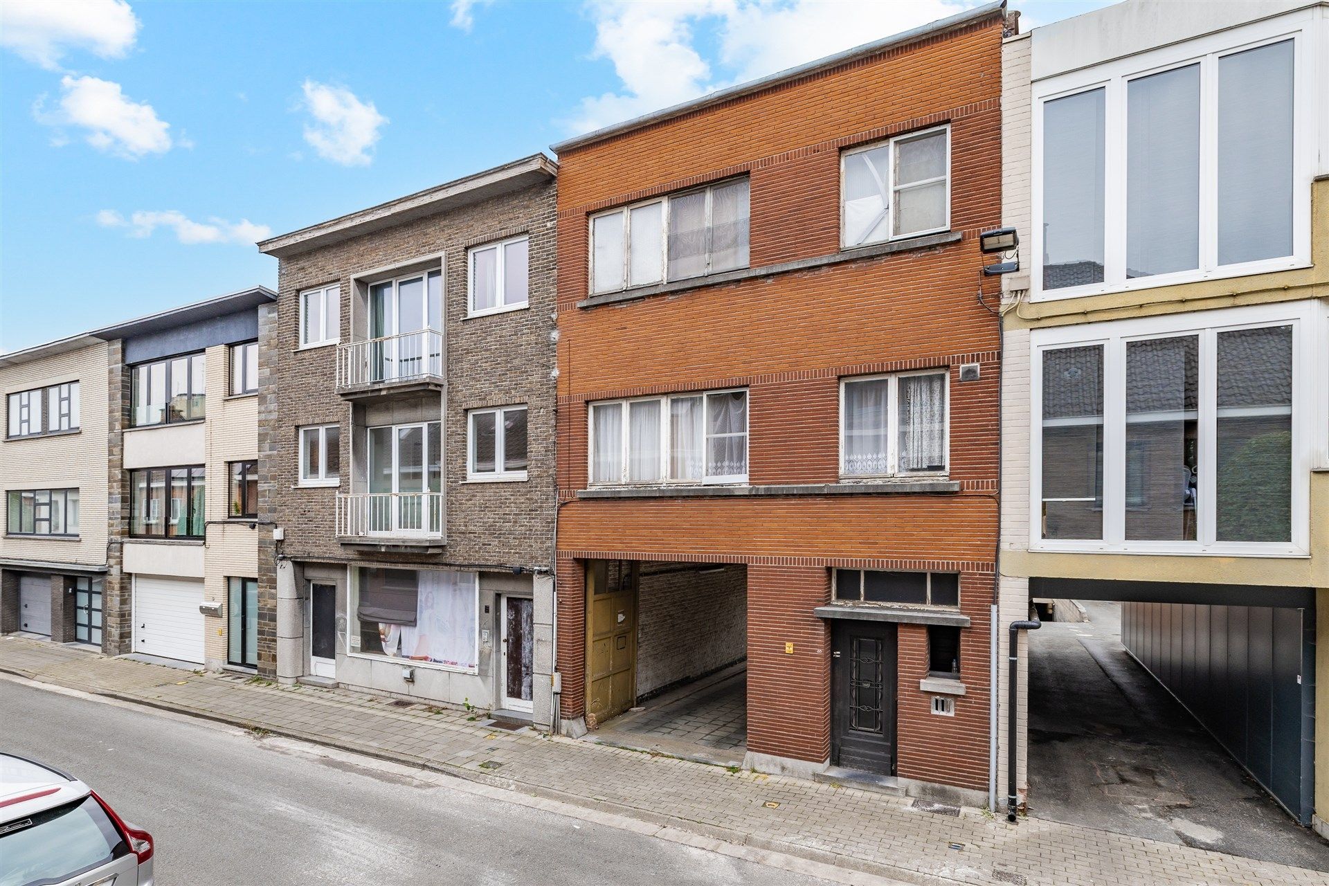 Renovatieproject bestaande uit 3 appartementen + 1 huis + 8 garageboxen foto 26