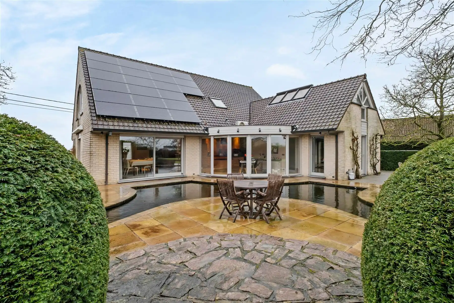 Instapklare en lichtrijke woning met zonnige tuin op 1.304 m² in Ingooigem foto 13