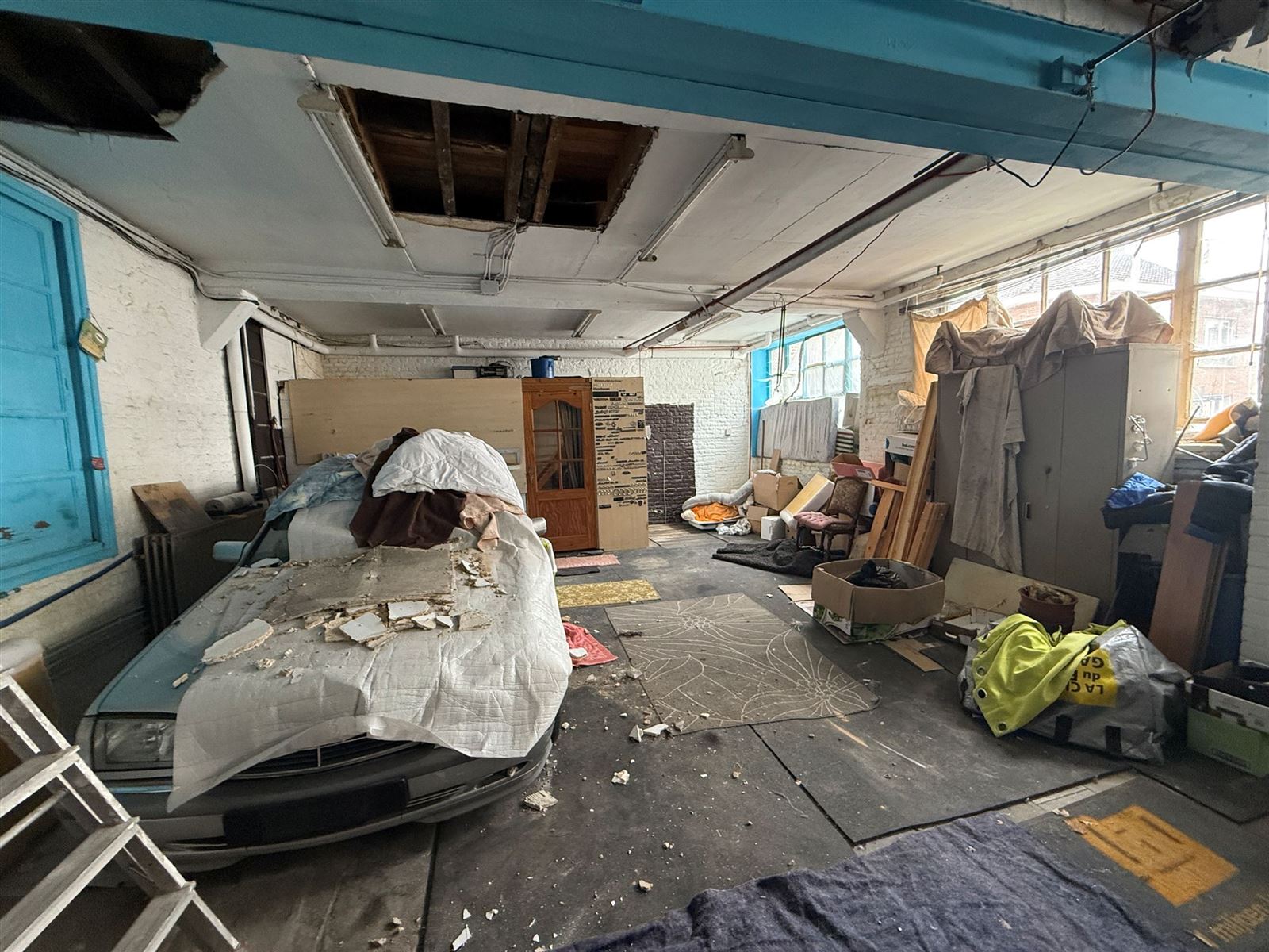 Te renoveren woning met grote garage foto 10