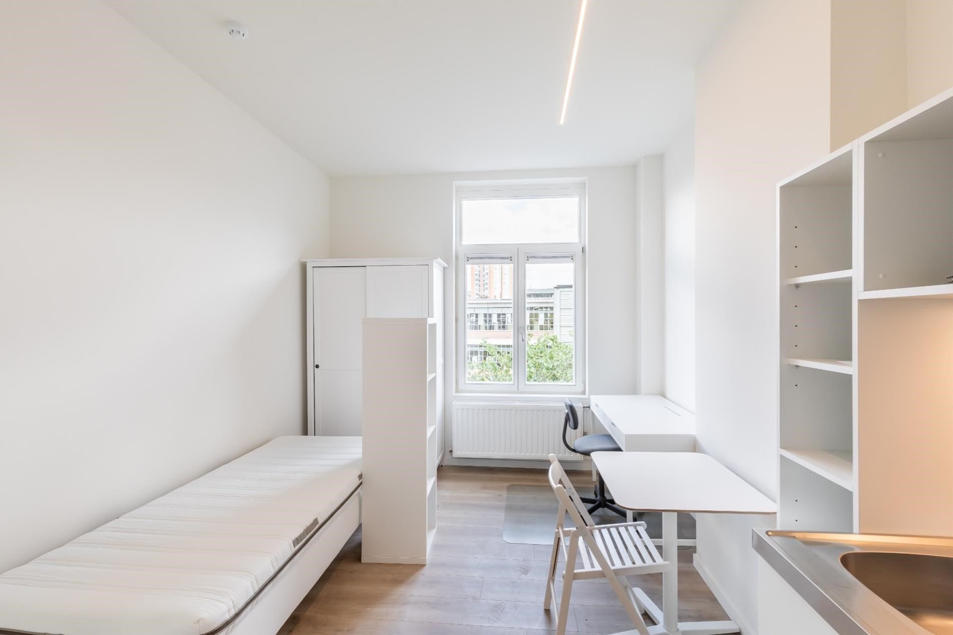 Bemeubelde studentenstudio in hartje Leuven foto {{pictureIndex}}