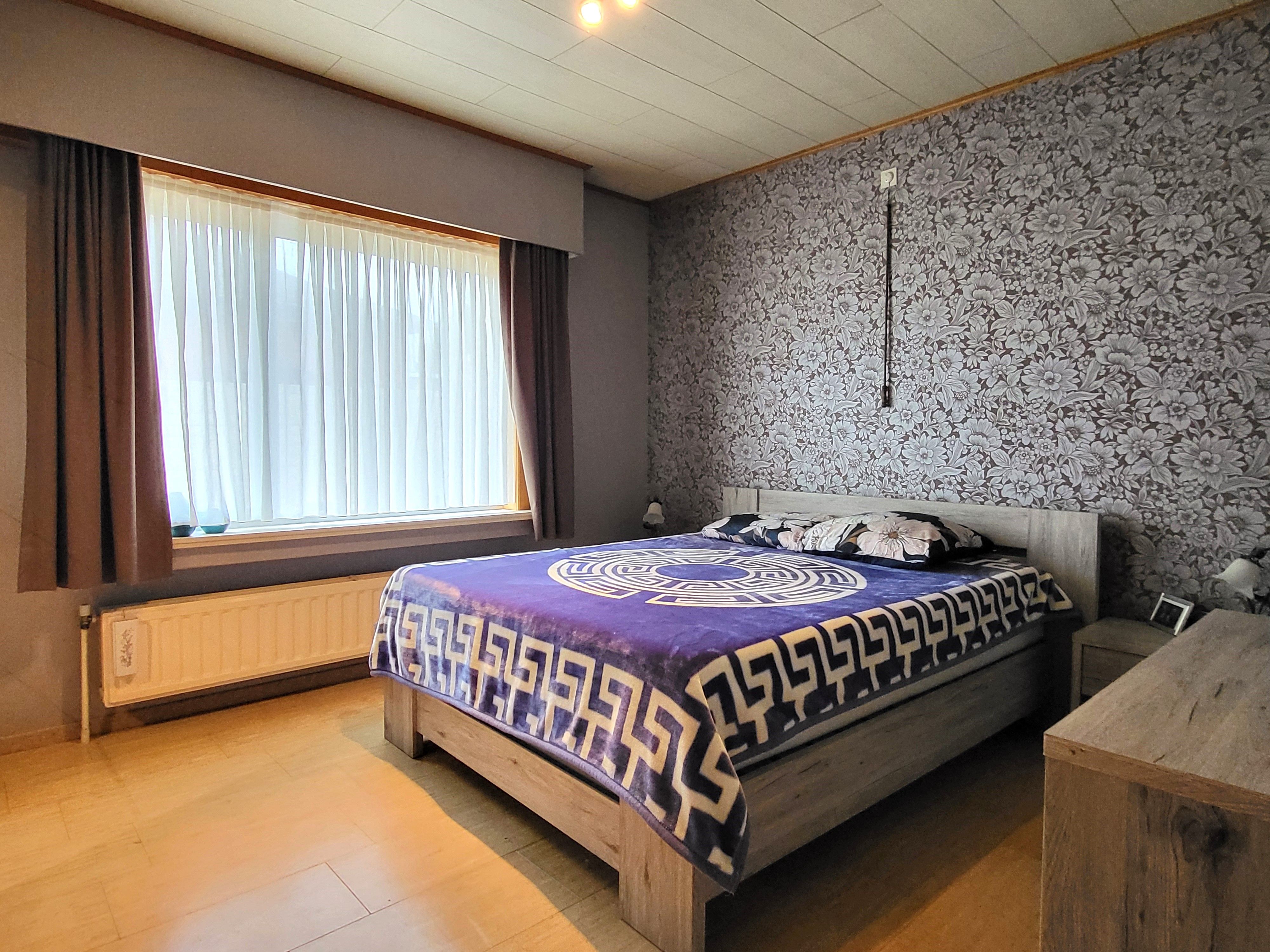 Instapklare villa op een perceel van 648 m² met dubbele garage, veranda en tuin.  foto 24