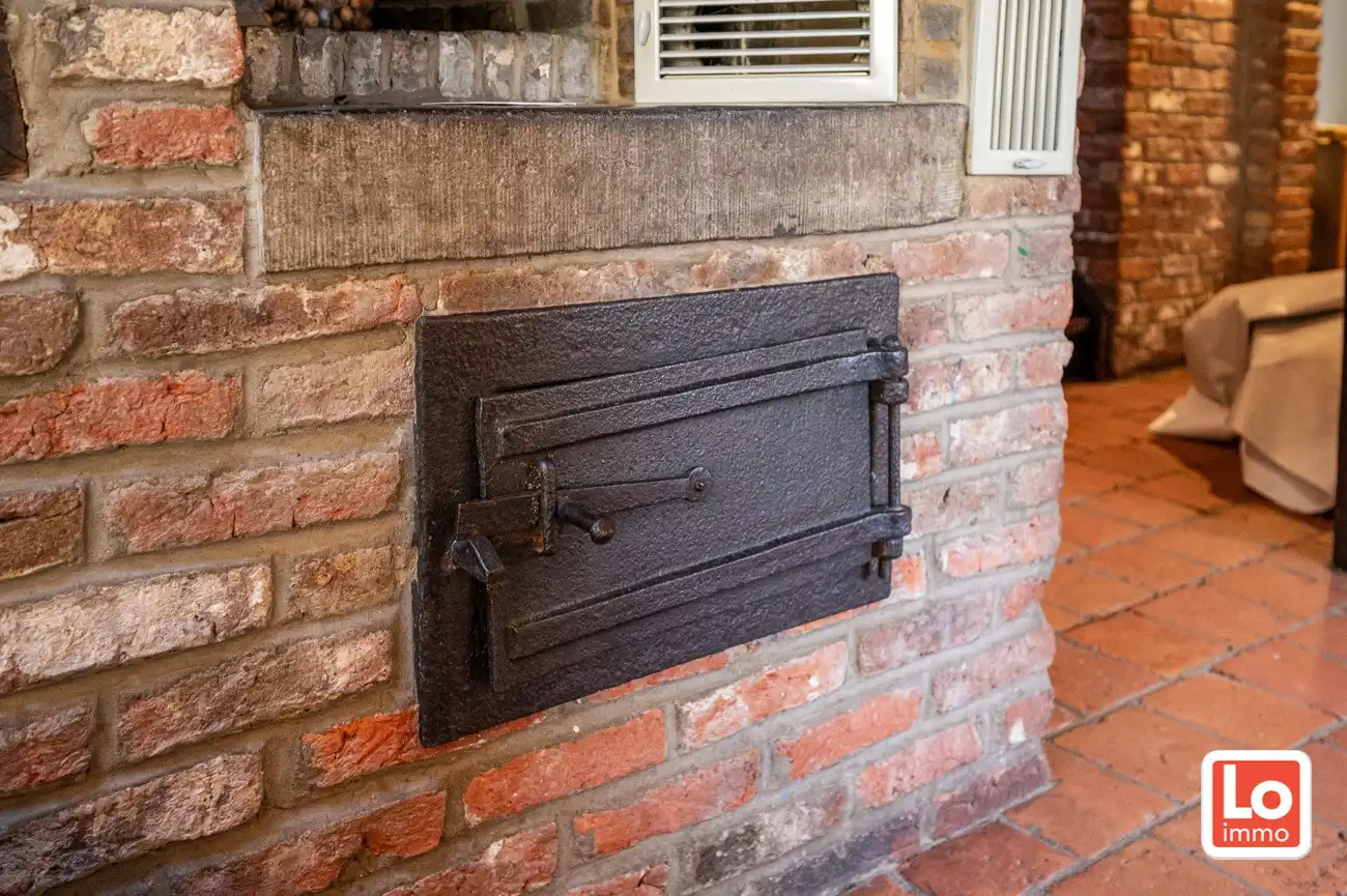 VERKOCHT! Charmante alleenstaande woning met inpandige dubbele garage en grote tuin met aanpalend bos (1ha) op een rustige locatie nabij het centrum van Wachtebeke! foto 11