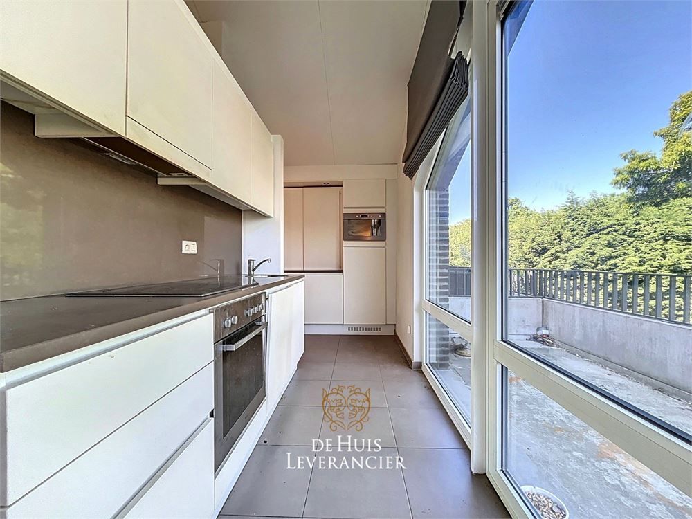 Luxueuze serviceflat met 1 slk en ruim terras foto 3