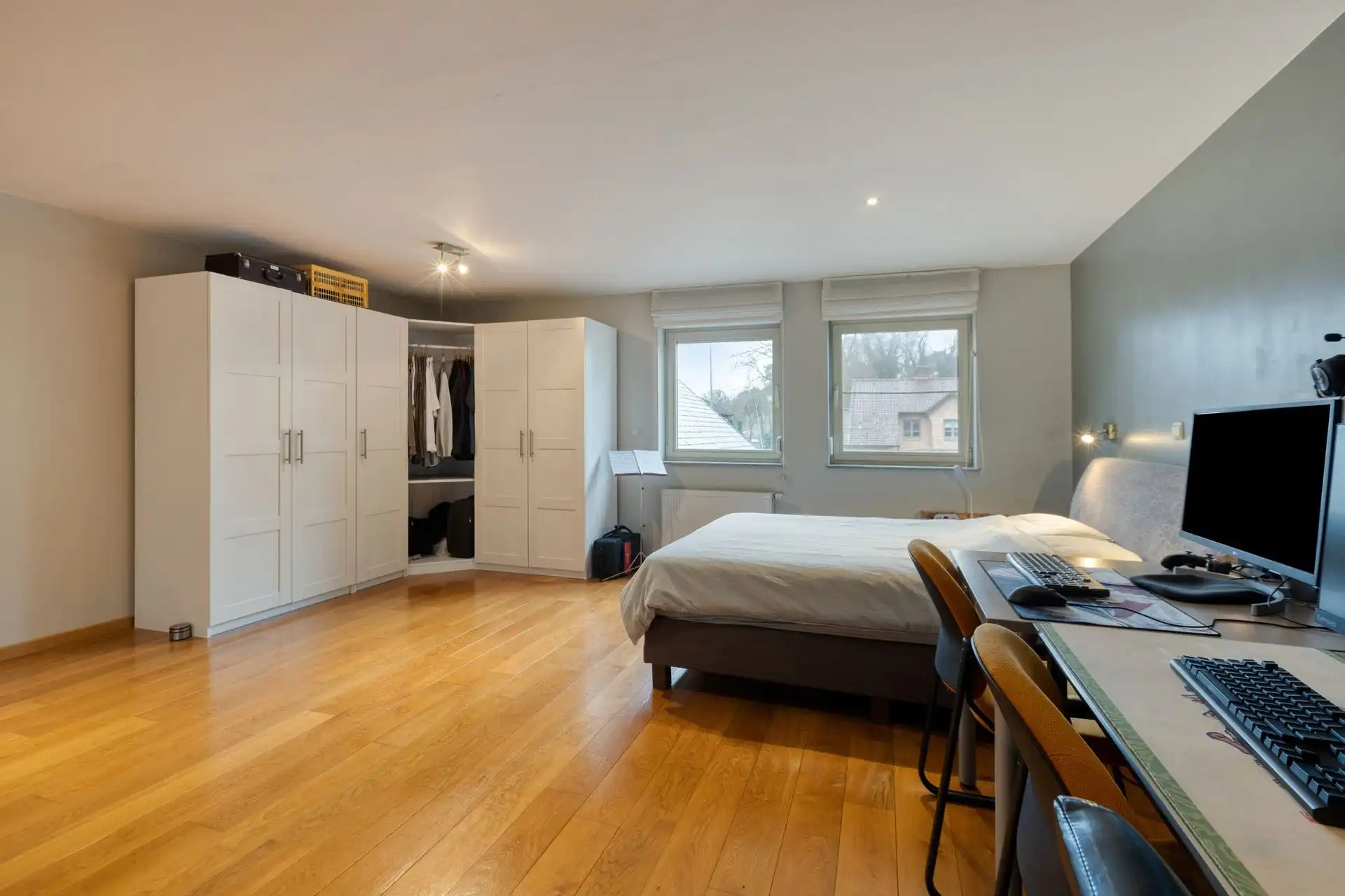 Ruime woning met maar liefst 4 slaapkamers én praktijkruimte in Maasmechelen! foto 15