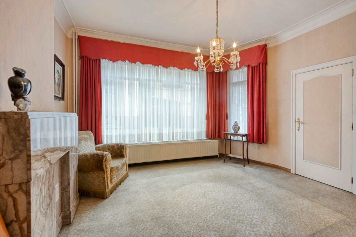 Te renoveren rijwoning in hartje Bilzen foto 6