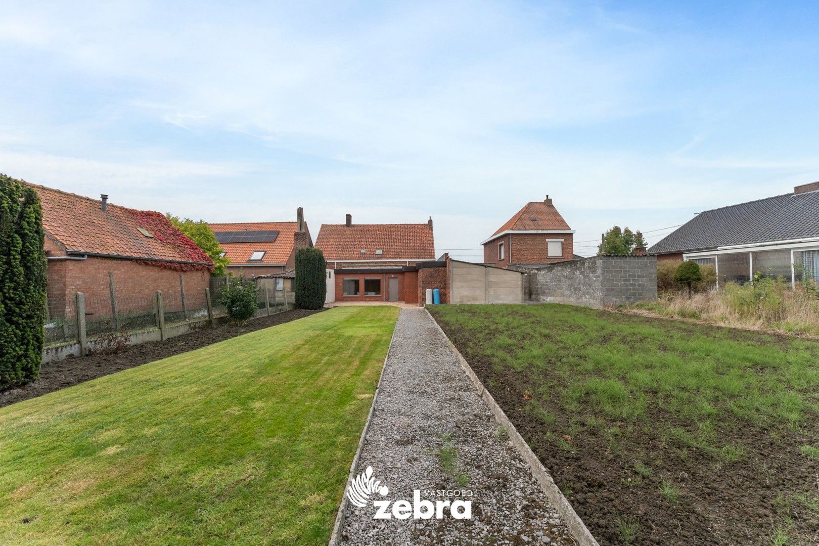 Hoofdfoto van de publicatie: Op te frissen woning met 5 slaapkamers & dubbele garage op een landelijke ligging!