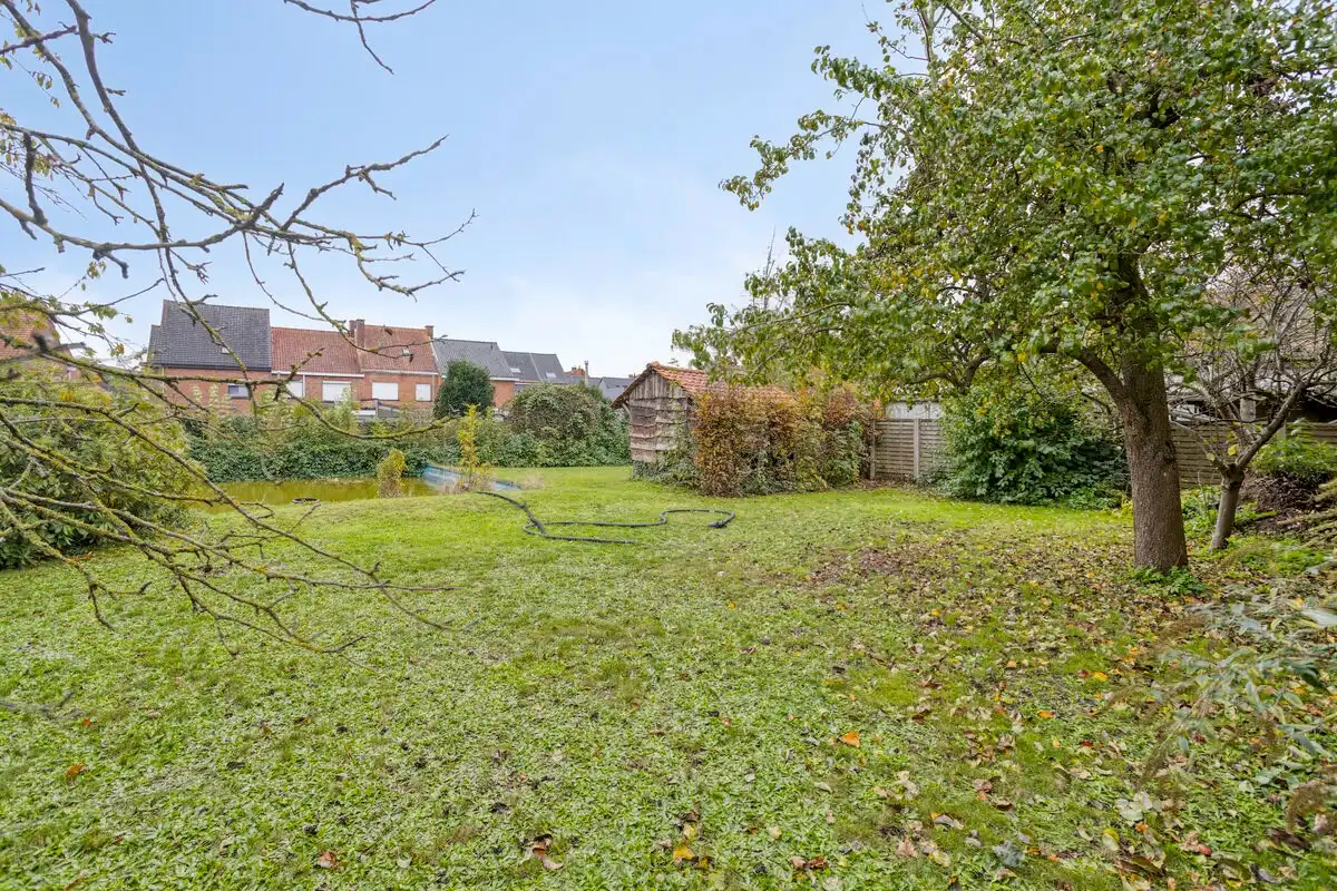 Bijzonder ruime woning met inpandige garage en 3 slks op een perceel van 1218 m². foto 23