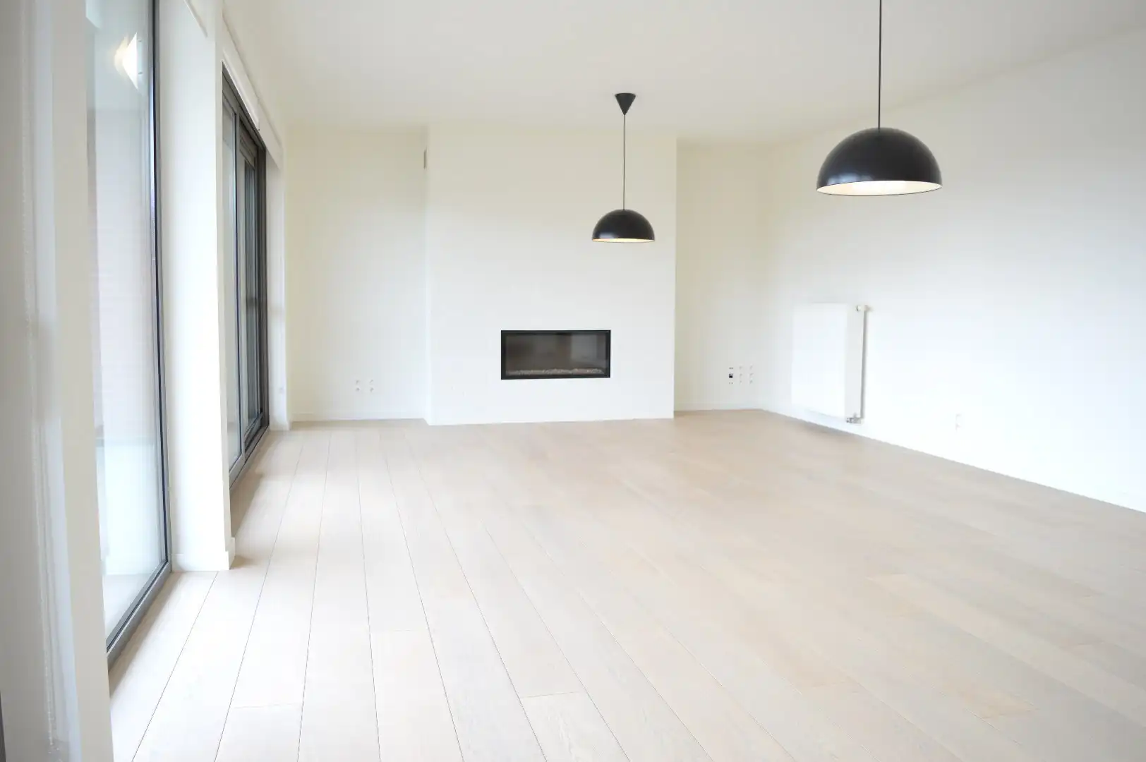 Ruim instapklaar appartement met 3 slaapkamers en autostaanplaats te koop nabij centrum Harelbeke foto 2