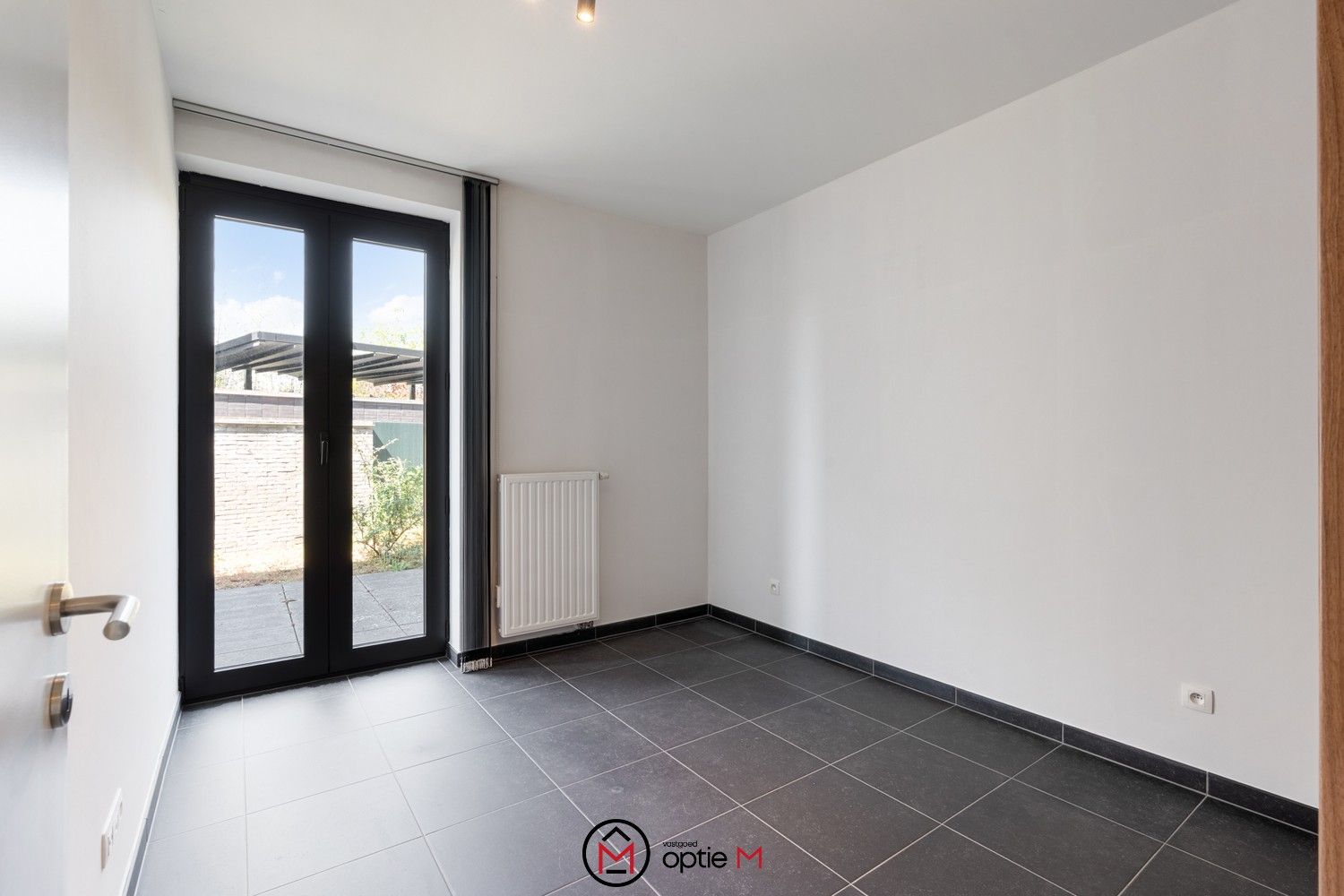 Gelijkvloers appartement met terras, tuin en kelder foto 10