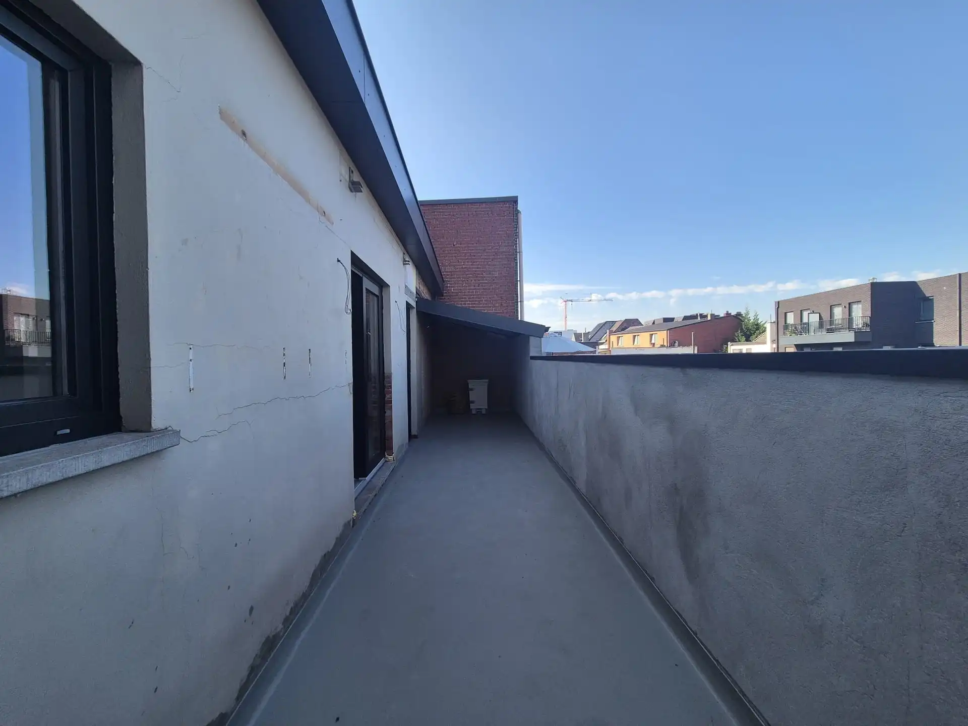 Ruim triplex appartement met polyvalente ruimte op toplocatie in het hart van Wetteren foto 27