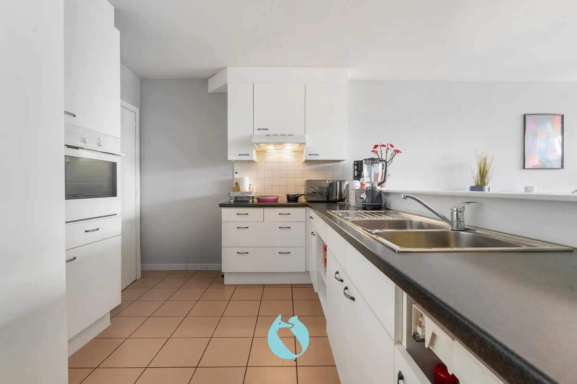 Gelijkvloers appartement met 2 slpks, tuin en garage foto 6