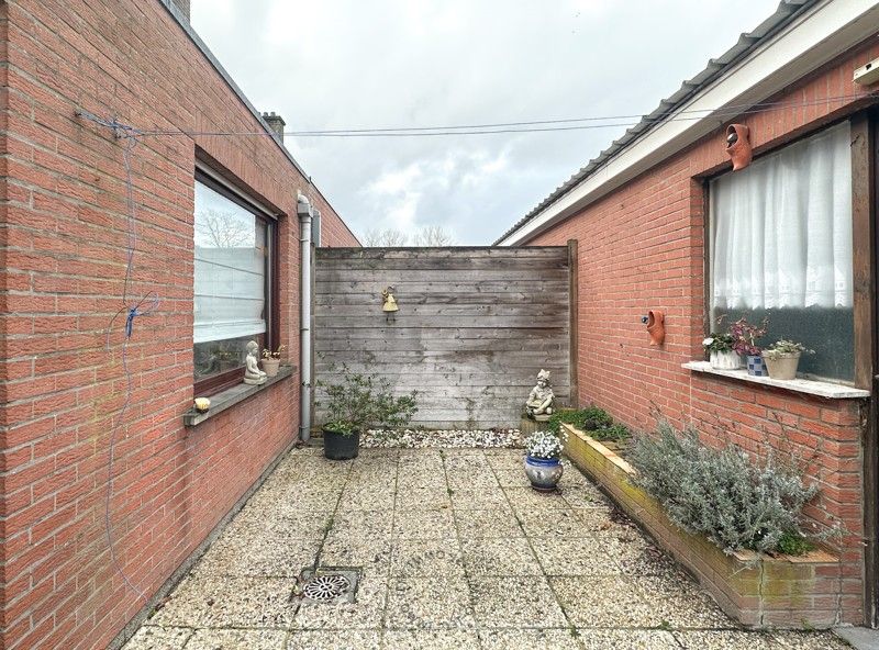 Woning met drie slaapkamers en tuin foto 17