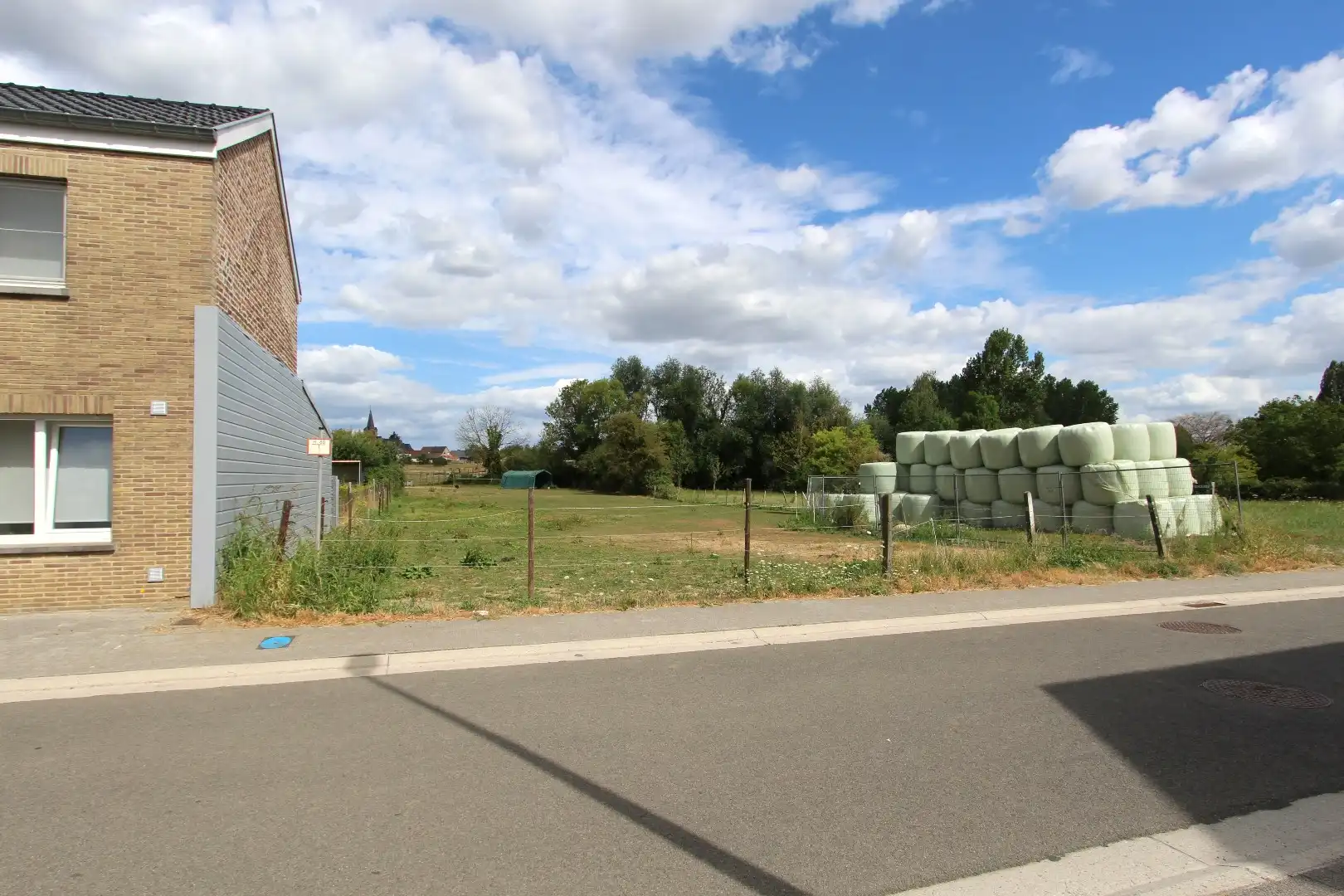 Perceel bouwgrond met diepe tuin - landelijk gelegen in Borgloon-Jesseren foto 3