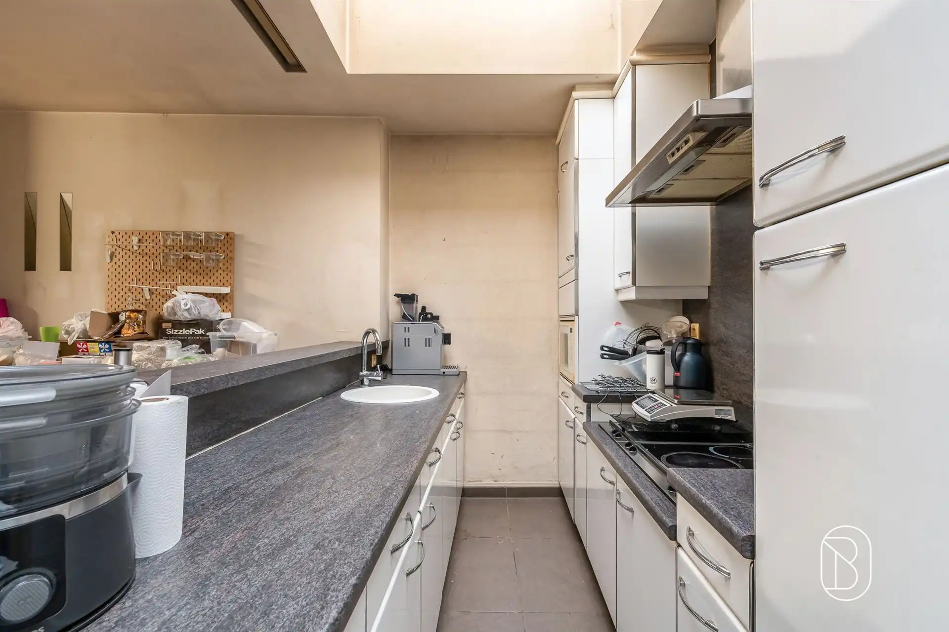 Voormalige bakkerij met woonst, garage, tuin en potentieel foto 16