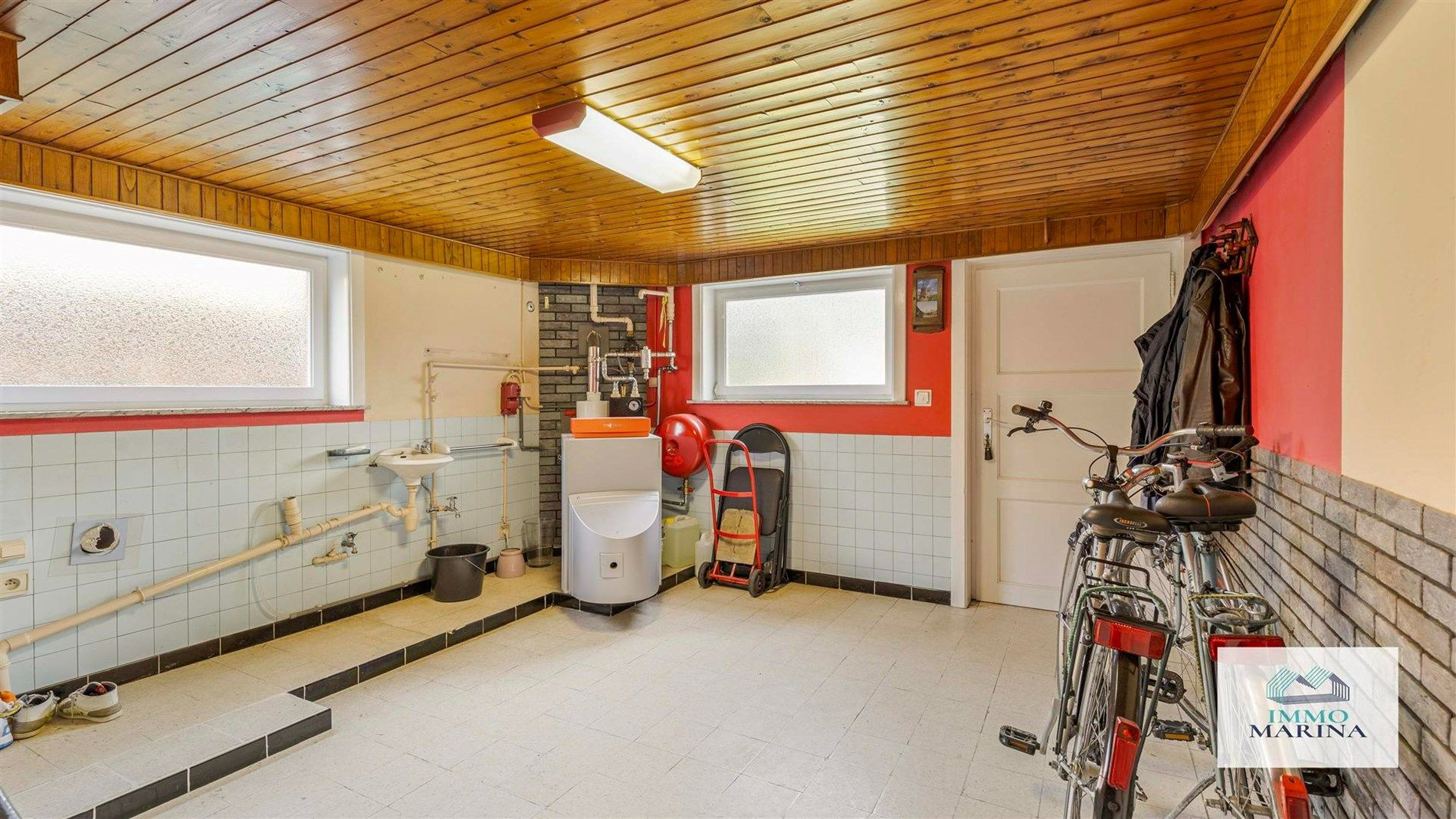 Goed onderhouden woning met garage, kelder en tuin op 6,4a te Baal foto 18