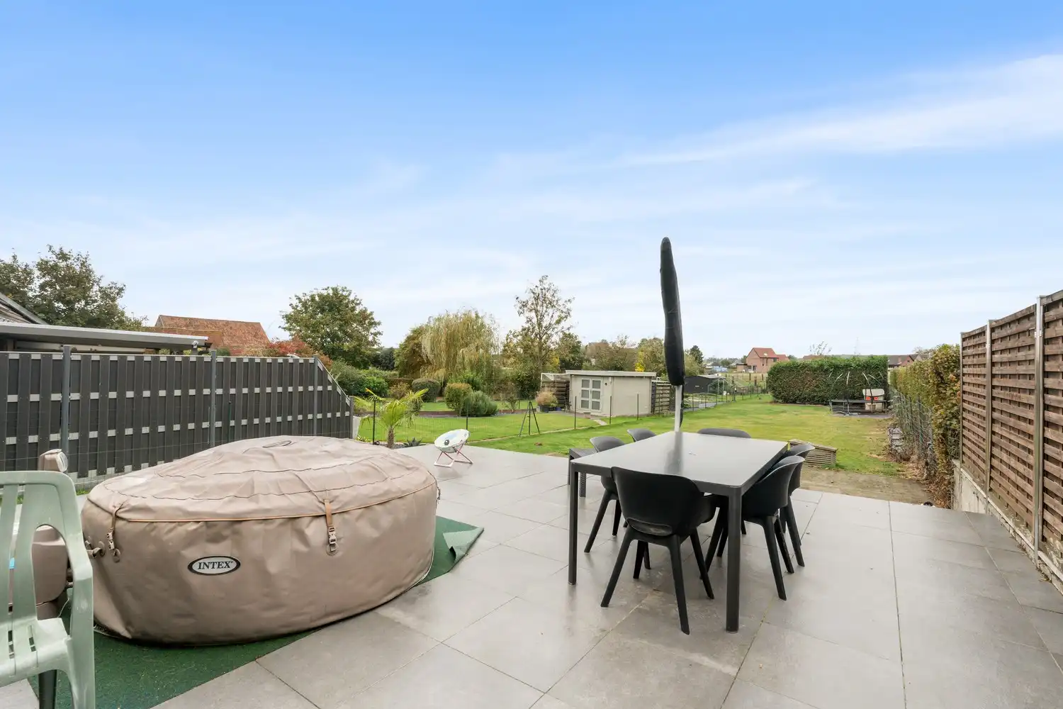 Prachtige 3-gevelwoning met studio, grote tuin en vrij uitzicht foto 21