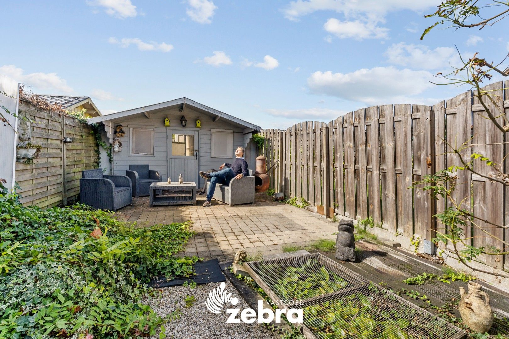 Op te frissen woning met zuidwestgerichte tuin en uitweg op een centrale ligging te Tielt! foto 24