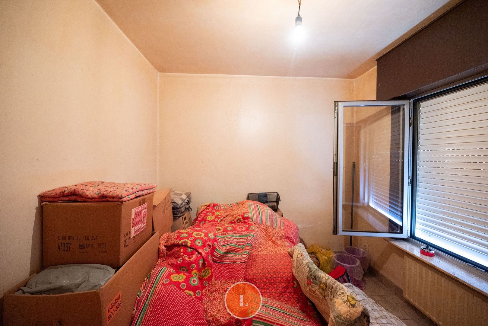 Opbrengsteigendom op het gelijkvloers 2 slaapkamer en garage in Roeselare. foto 5
