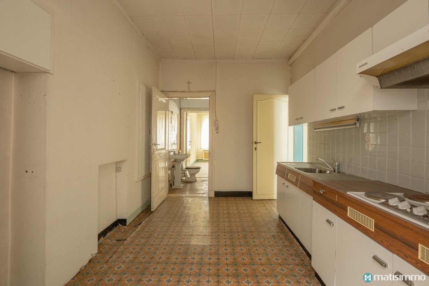 GOED GELEGEN PROJECT VOOR 3 APPARTEMENTEN + 6 AUTOSTAANPLAATSEN IN CENTRUM BILZEN foto 24